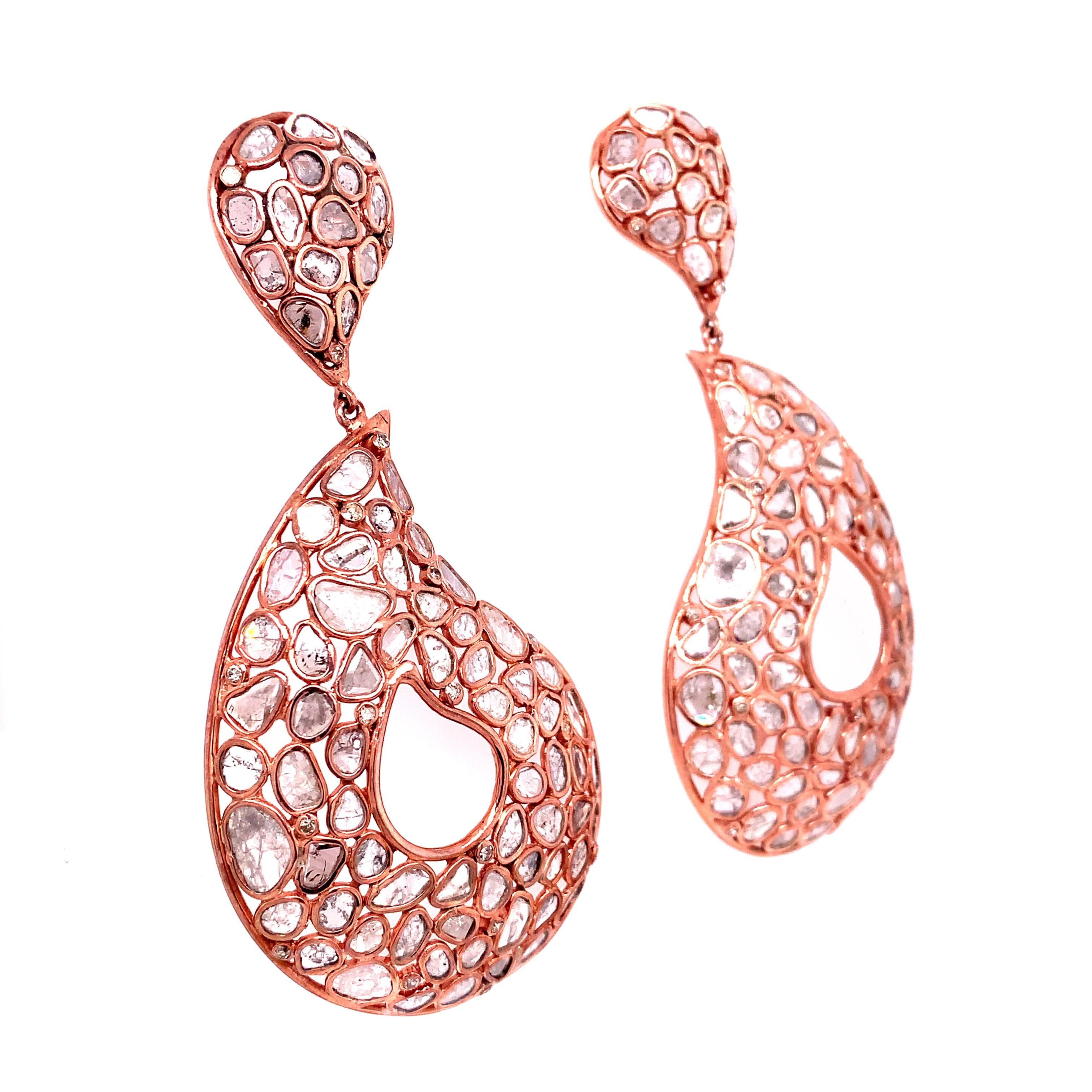 Nebula Collection

Grayish colored Slice Diamond crescent moon tear drop shaped earring set in Sterling Silver and 14K Rose gold plated.

Slice Diamond: 9.97ct total weight.
Diamond: 0.49ct total weight.