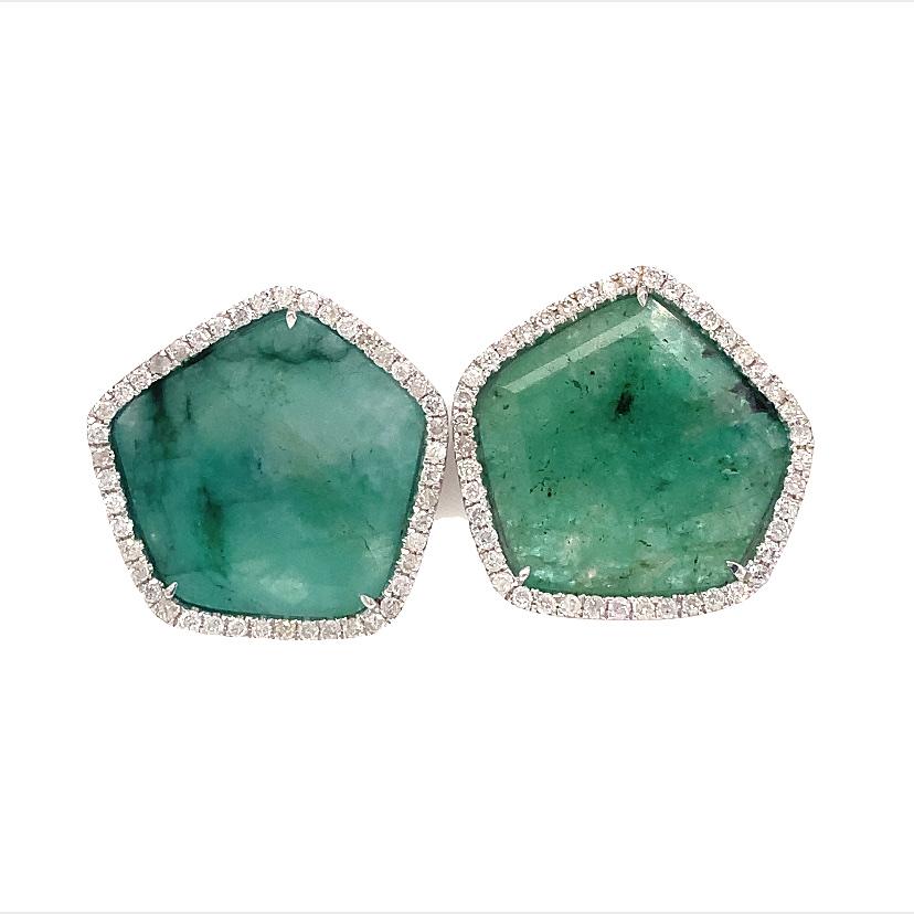 Lillipad Collection

 Natural Slice Emerald wrapped by Diamonds  earrings set in 18k white gold.

Emerald: 8.63ct total weight
Diamond: 0.43ct total weight