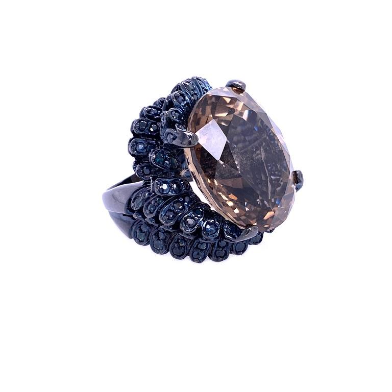 Life In Color Collection 

Bold Smokey Quartz and blue Sapphire cocktail ring set in blackened sterling silver.
