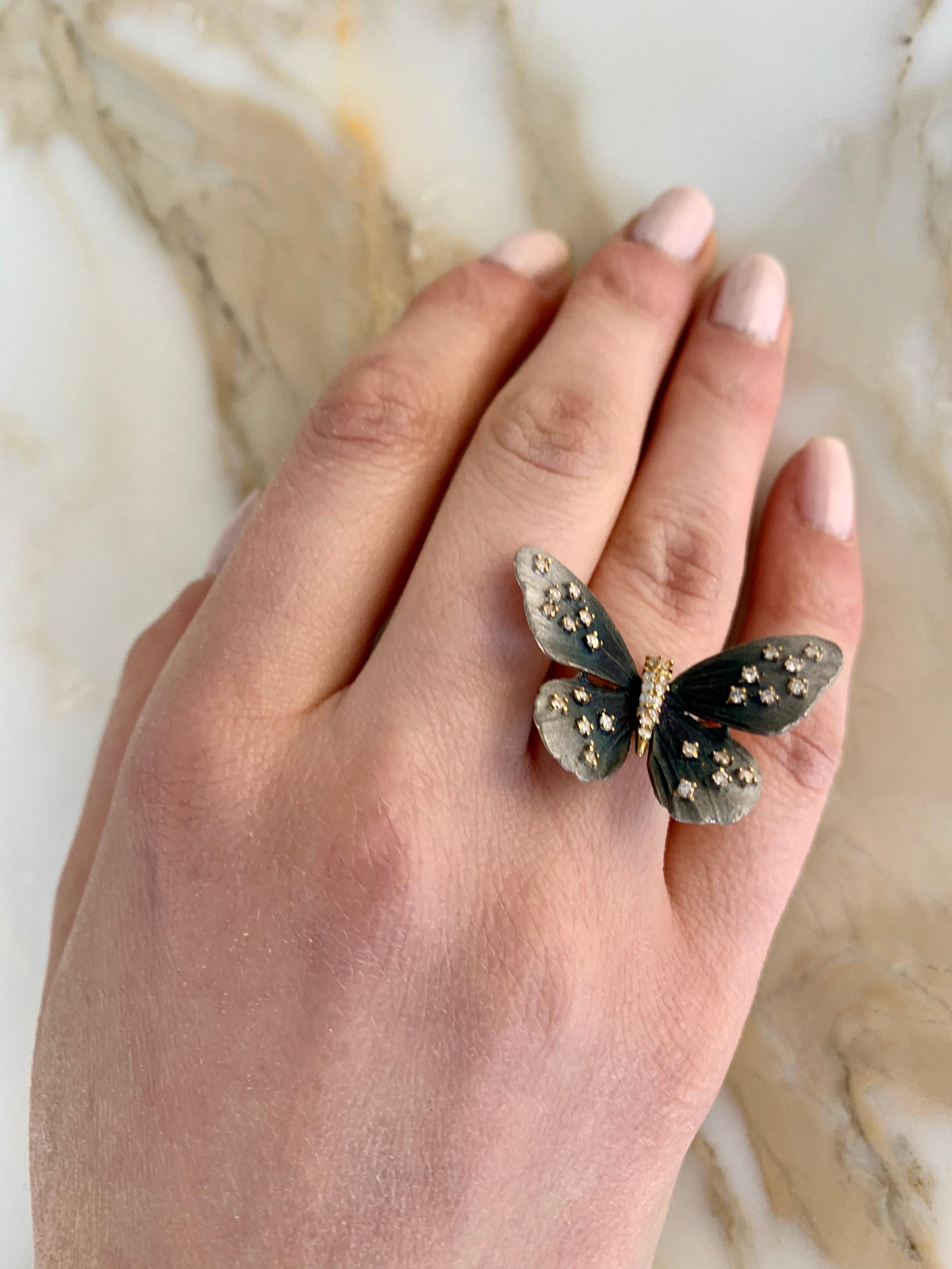Gray-Brown Collection

Butterfly tainted gray rhodium rind with Diamonds set in 18K yellow gold. US size 6.75

Diamonds: 0.46ct total weight.
All Diamonds are G-H / SI stones


