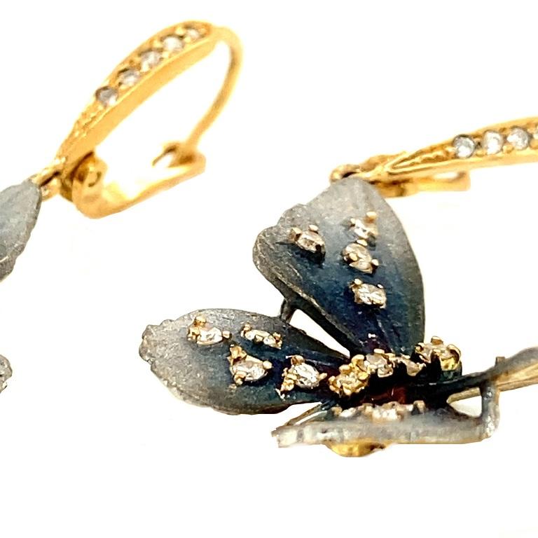 Gray-Brown Collection

Butterfly tainted rhodium earrings dangling with Diamonds set in 18K yellow gold.

Diamonds: 0.95ct total weight.
All Diamonds are G-H / SI stones

