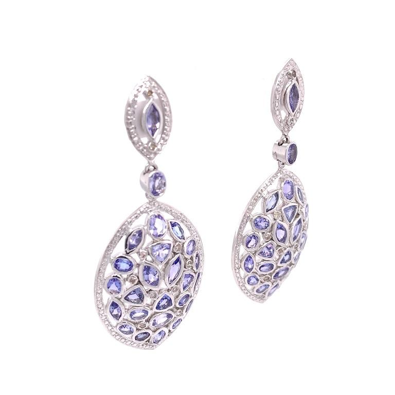 Life In Color Collection

Mosaic pattern Tanzanite and Diamond Earrings bezel set in sterling silver.

Tanzanite: 10.49ct total weight.
Diamond: 0.51ct total weight.