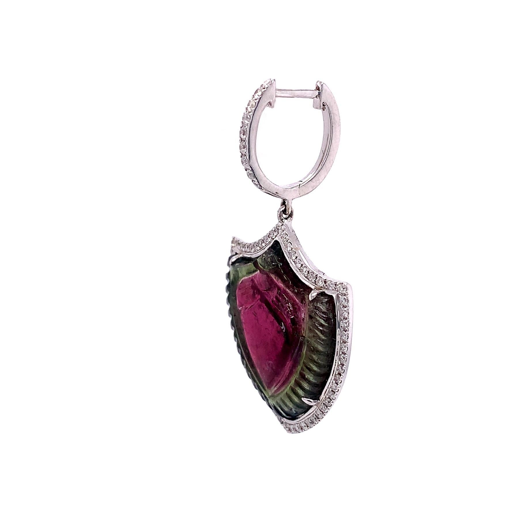 Exclusive Collection,

Bi-color tourmaline featuring shield shape with diamonds drop earring are set in 18k White gold.

Tourmaline: 26.06 ct total weight.
Diamond: 0.69 ct total weight.
All diamonds are G-H/SI stones.
