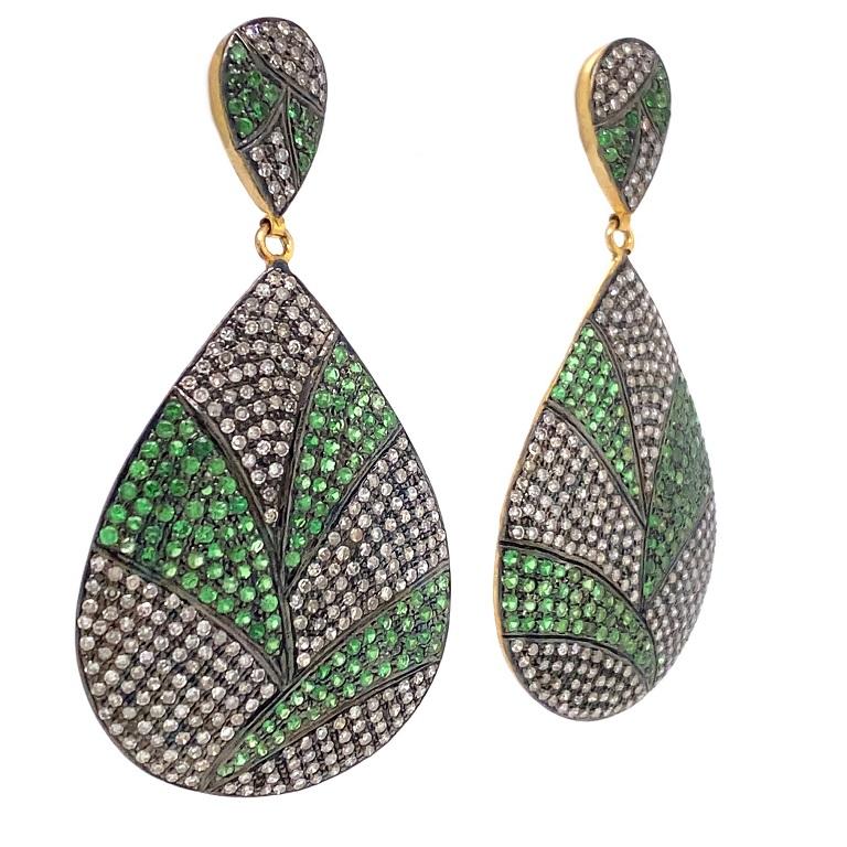 Rustic Collection 

Bright green Tsavorite Garnet and rustic Diamond drop earrings set in sterling silver and gold plating.  

