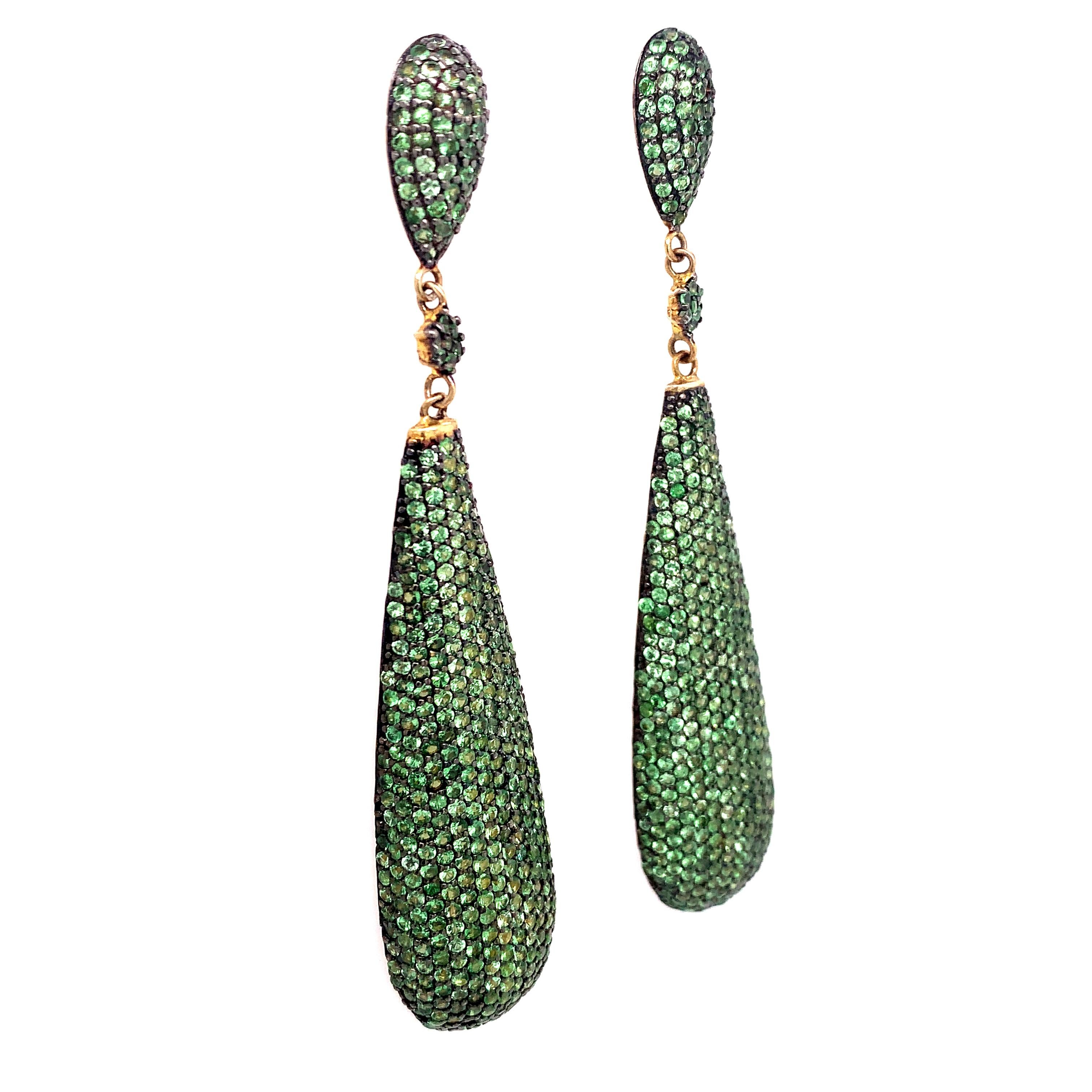 Life In Color Collection 

Bright green Tsavorite Garnet pave pebble elongated earrings set in sterling silver and 14k plated gold

Tsavorite:  11.73ct total weight.

