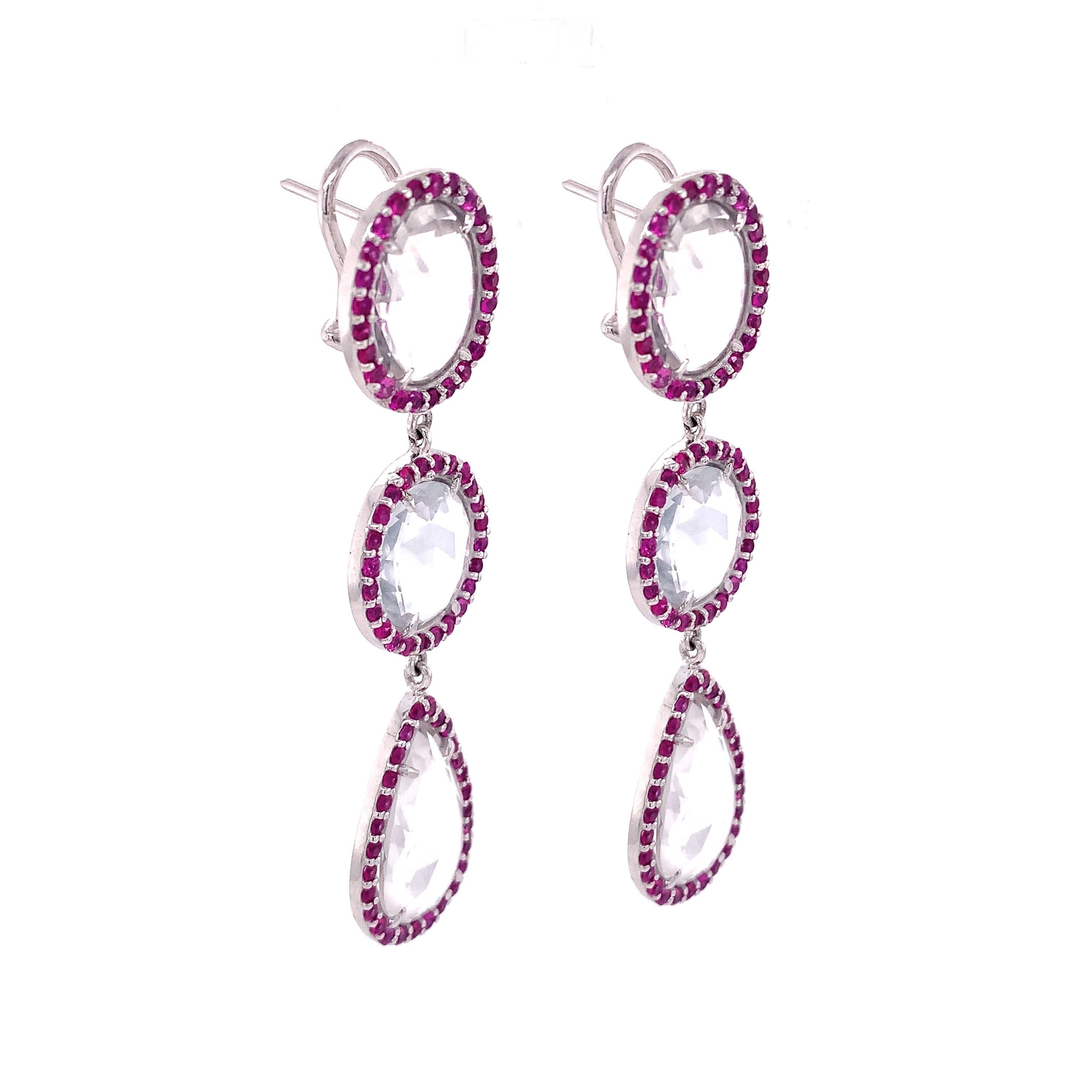 Life in color Collection

Different shape of white Topaz accented by very bright pink Sapphire halo triple drop earrings set in Sterling Silver. 

Moonstone: 21.44 ct total weight.
Pink Sapphire: 2.82 ct total weight.