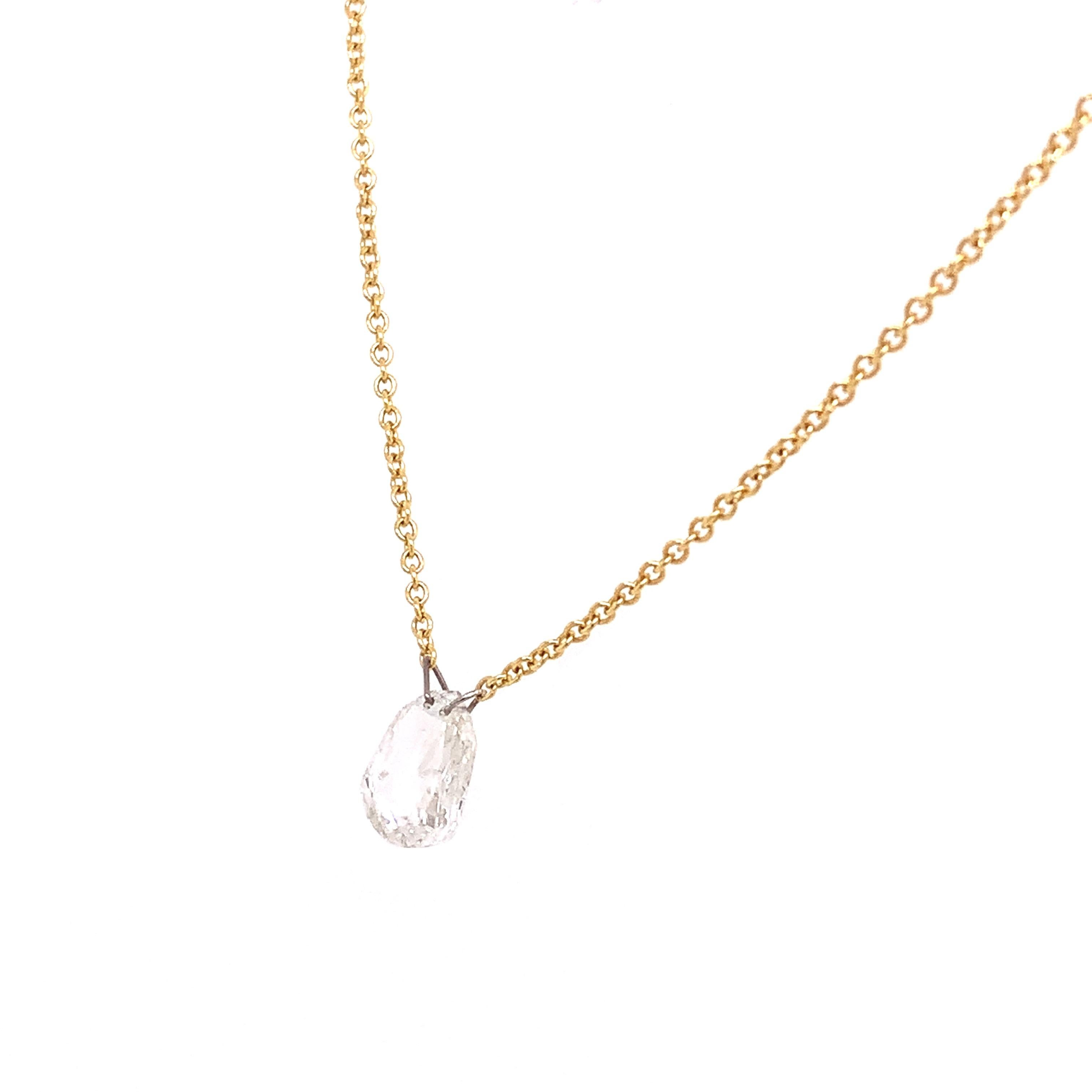 Dangling Diamond Collection,

A bold 18K Yellow Gold adjustable chain unleashes the inimitable beauty of the 0.76 carat Diamond dangling with a pierced Platinum ring.


