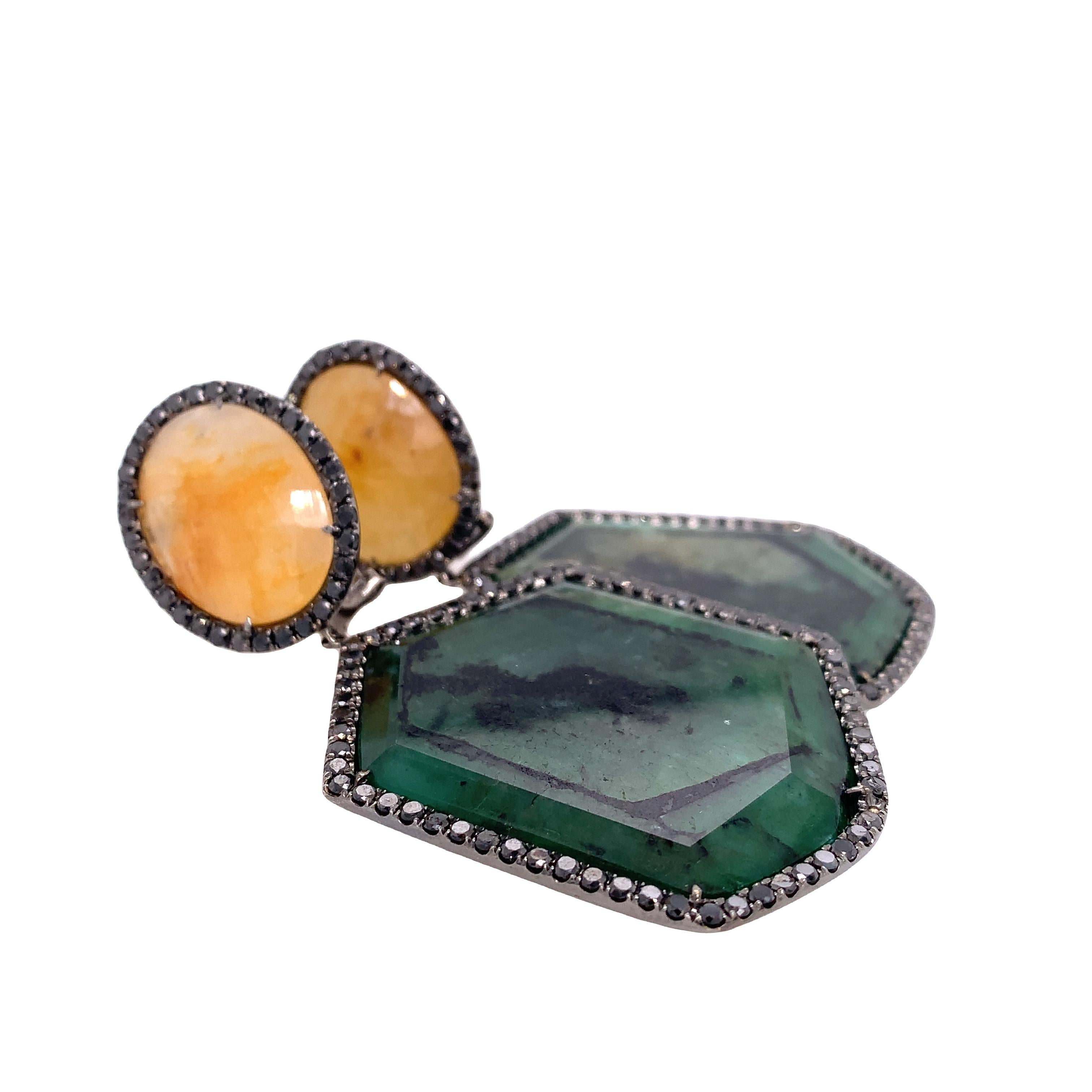 Lillipad Collection

Yellow Sapphire and natural Slice Emerald wrapped by Black Diamond statement earrings set in 18k black gold.

Emerald: 84.28ct total weight
Yellow Sapphire: 32.38ct total weight
Black Diamond: 4.86ct total weight