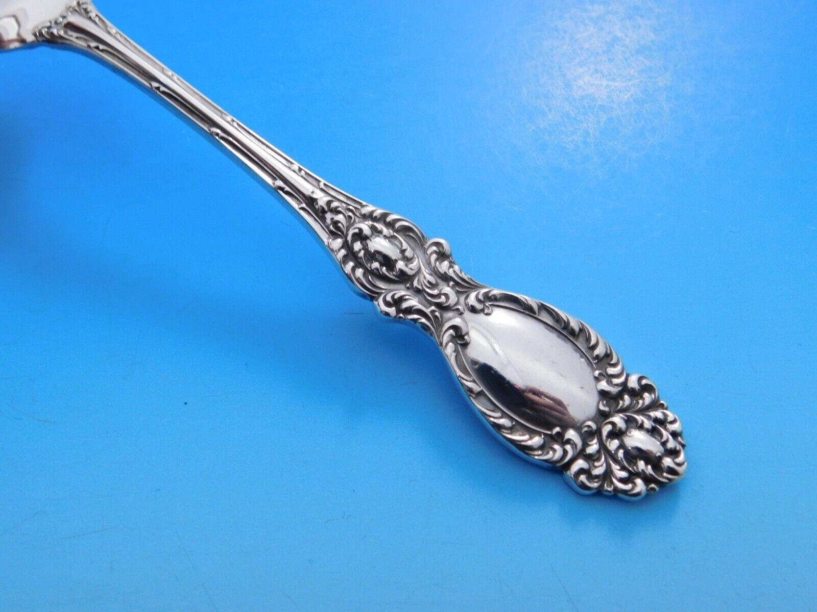 Lucerne by Wallace sterling silver flatware set - 60 pieces. This pattern was introduced in the year 1896 and was discontinued in the year 1996. The pieces features beautiful scroll work with particularly lovely salad forks and serving pieces with