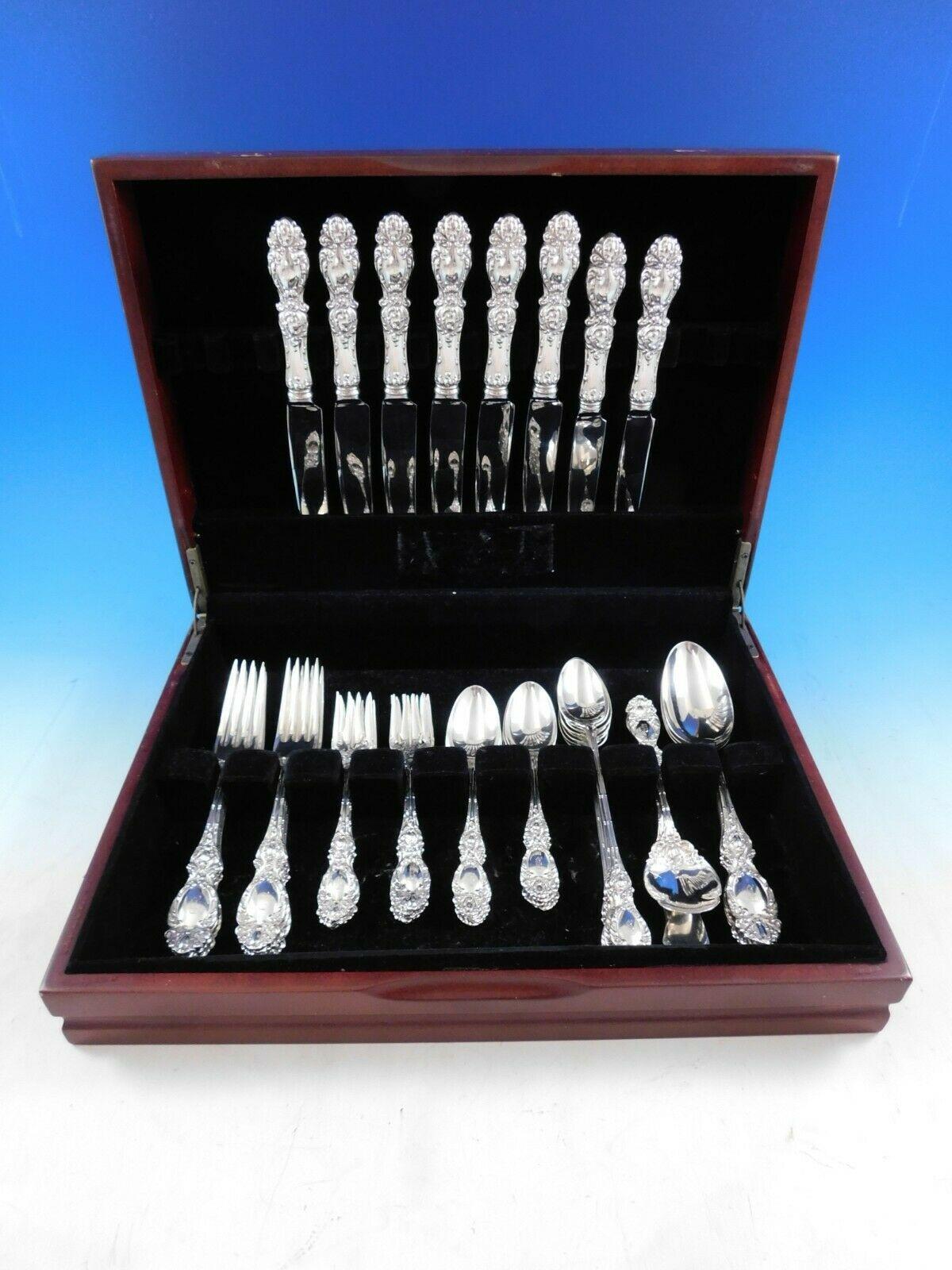 Lucerne by Wallace Sterling Silver flatware set - 45 pieces. This pattern was introduced in the year 1896 and was discontinued in the year 1996. The pieces features beautiful scroll work with salad forks and serving pieces with scroll work that