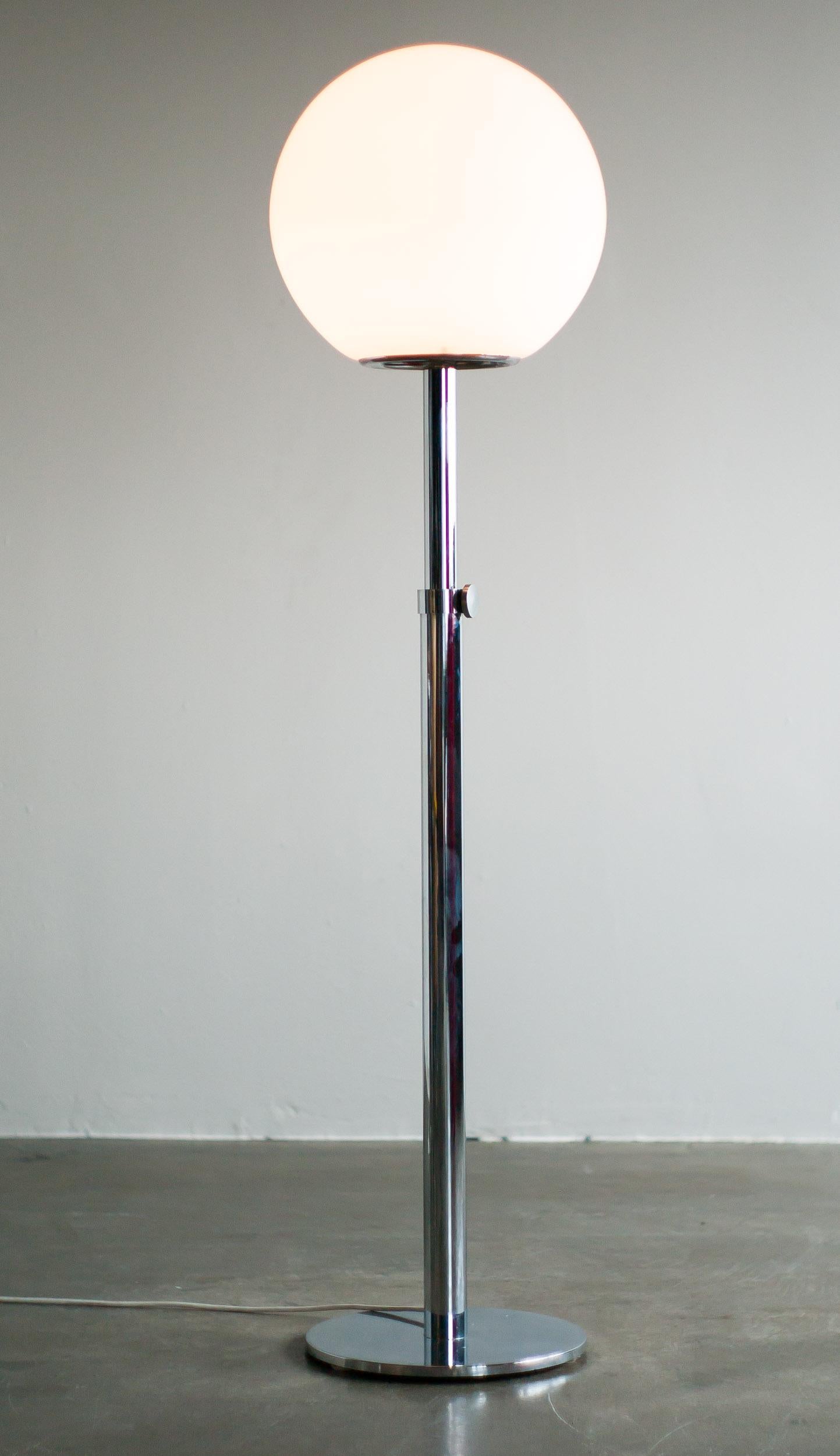 Height adjustable chrome floor lamp by Luci Illuminazione.
The opaline glass sphere creates a beautiful light.
Can be adjusted from 110 cm to 160 cm high.
 