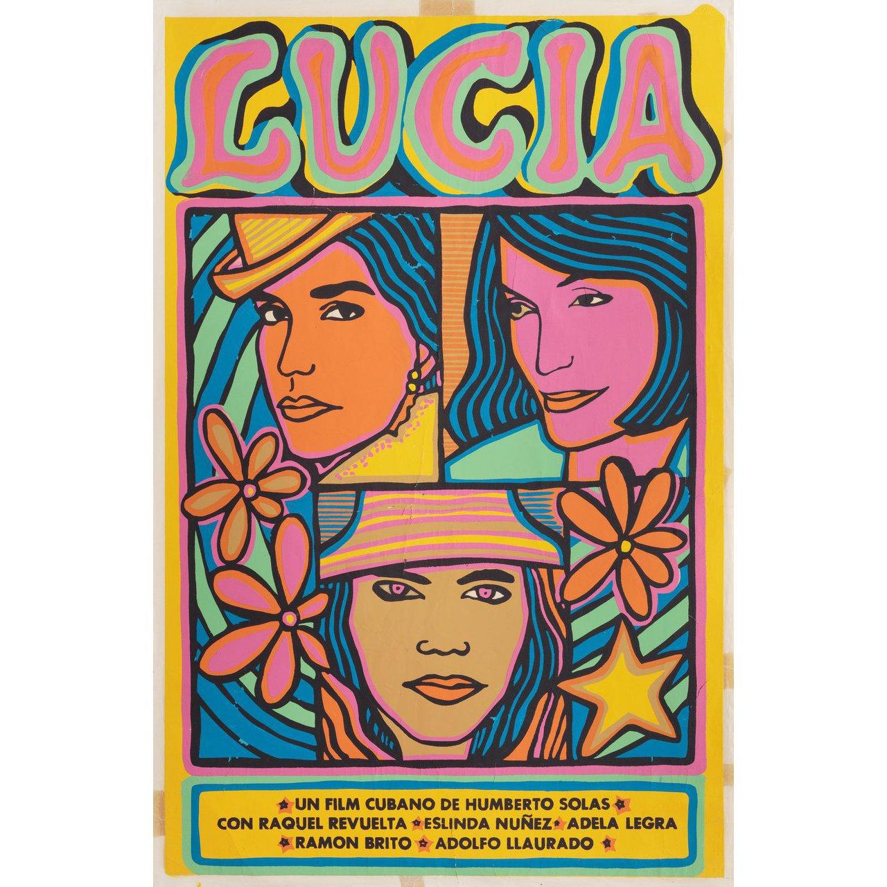 Original 1968 Cuban poster for the film Lucia directed by Humberto Solas with Raquel Revuelta / Eslinda Nunez / Adela Legra / Eduardo Moure. Very Good condition, rolled with tape stains. Please note: the size is stated in inches and the actual size