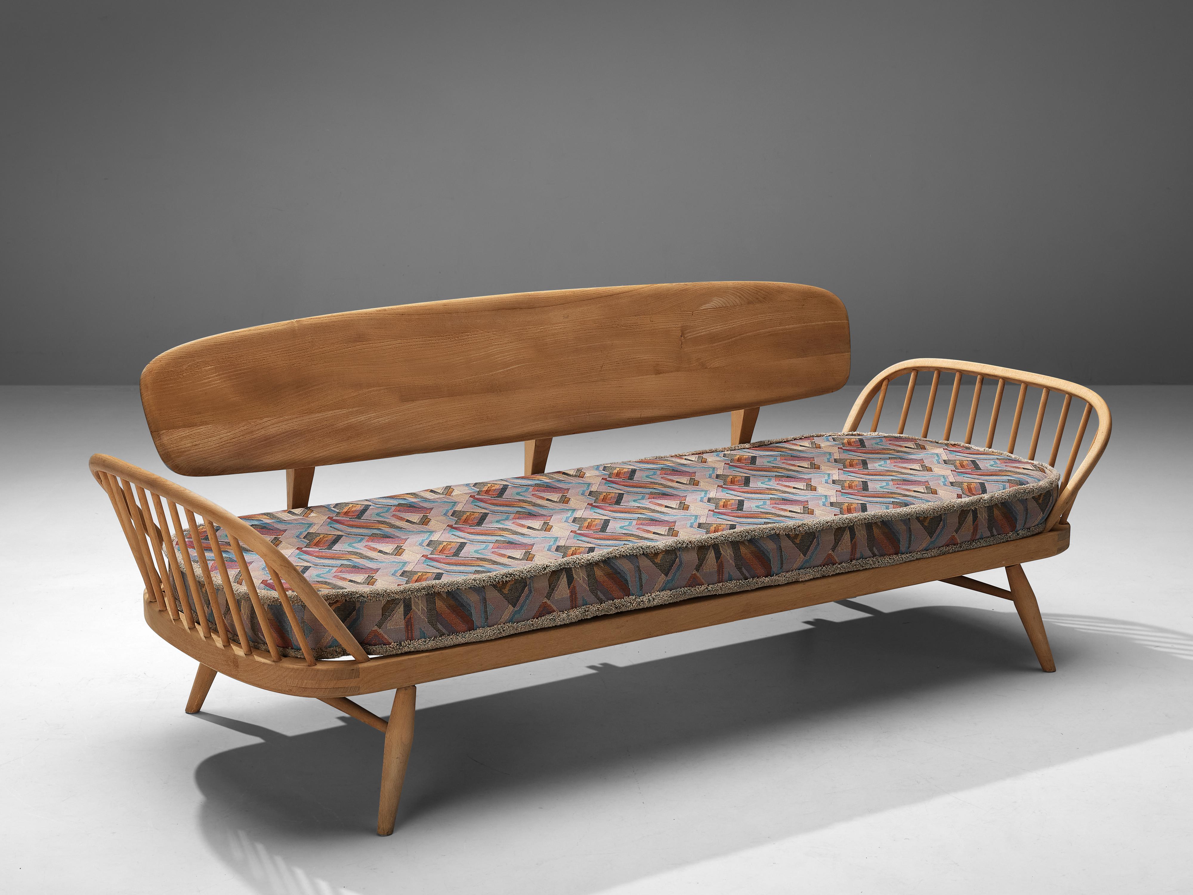 Lucian Ercolani for Ercol, sofa model ‘355’, beech, metal, fabric, United Kingdom, 1950s

The ‘studio sofa’, as Ercol describes it, derived from the ‘Originals’ series in the 1950s/1960s. All elements of the ‘Original’ collection were designed by