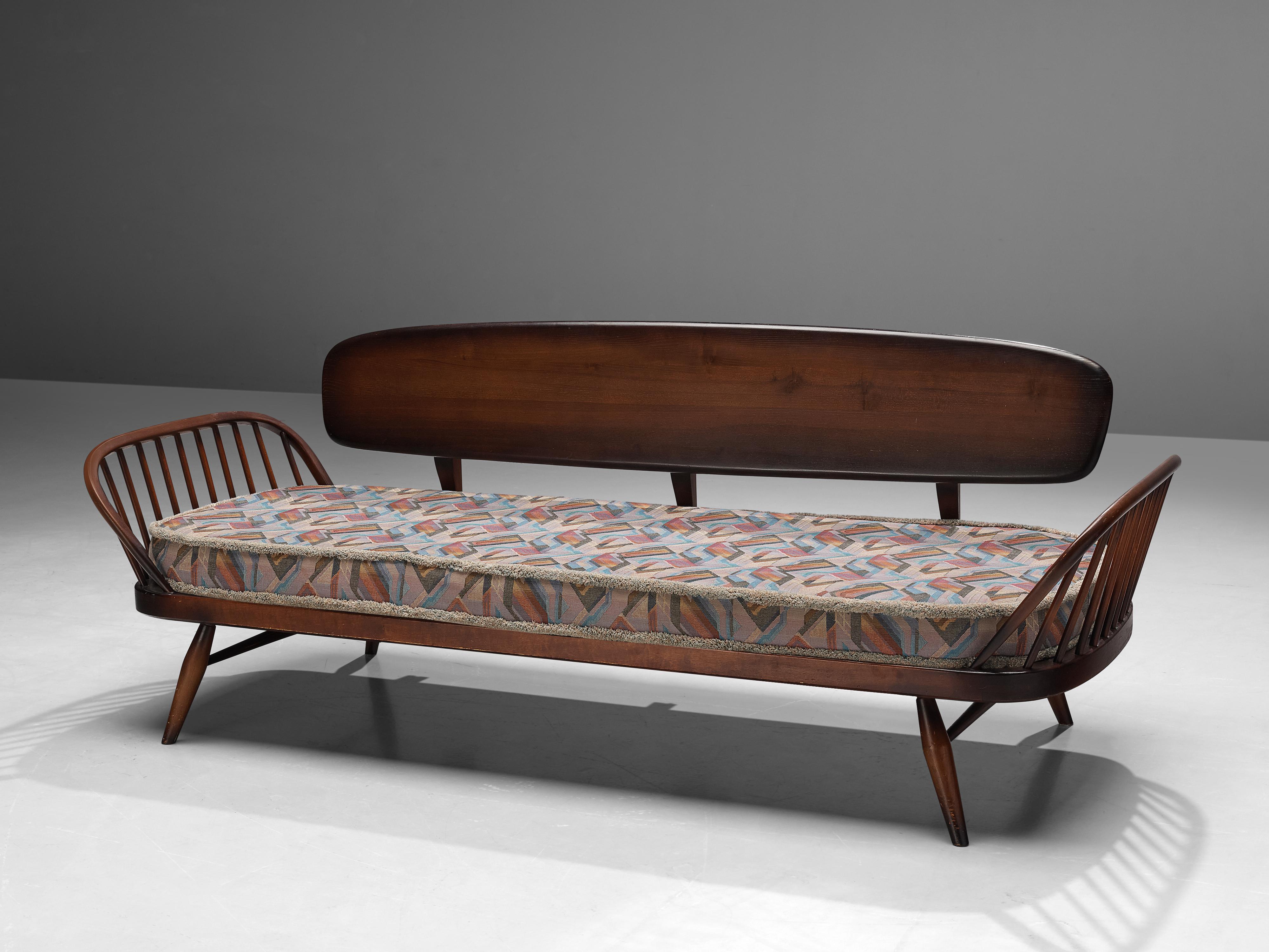 Lucian Ercolani for Ercol, sofa model ‘355’, stained beech, metal, fabric, United Kingdom, 1950s

The ‘studio sofa’, as Ercol describes it, derived from the ‘Originals’ series in the 1950s/1960s. All elements of the ‘Original’ collection were