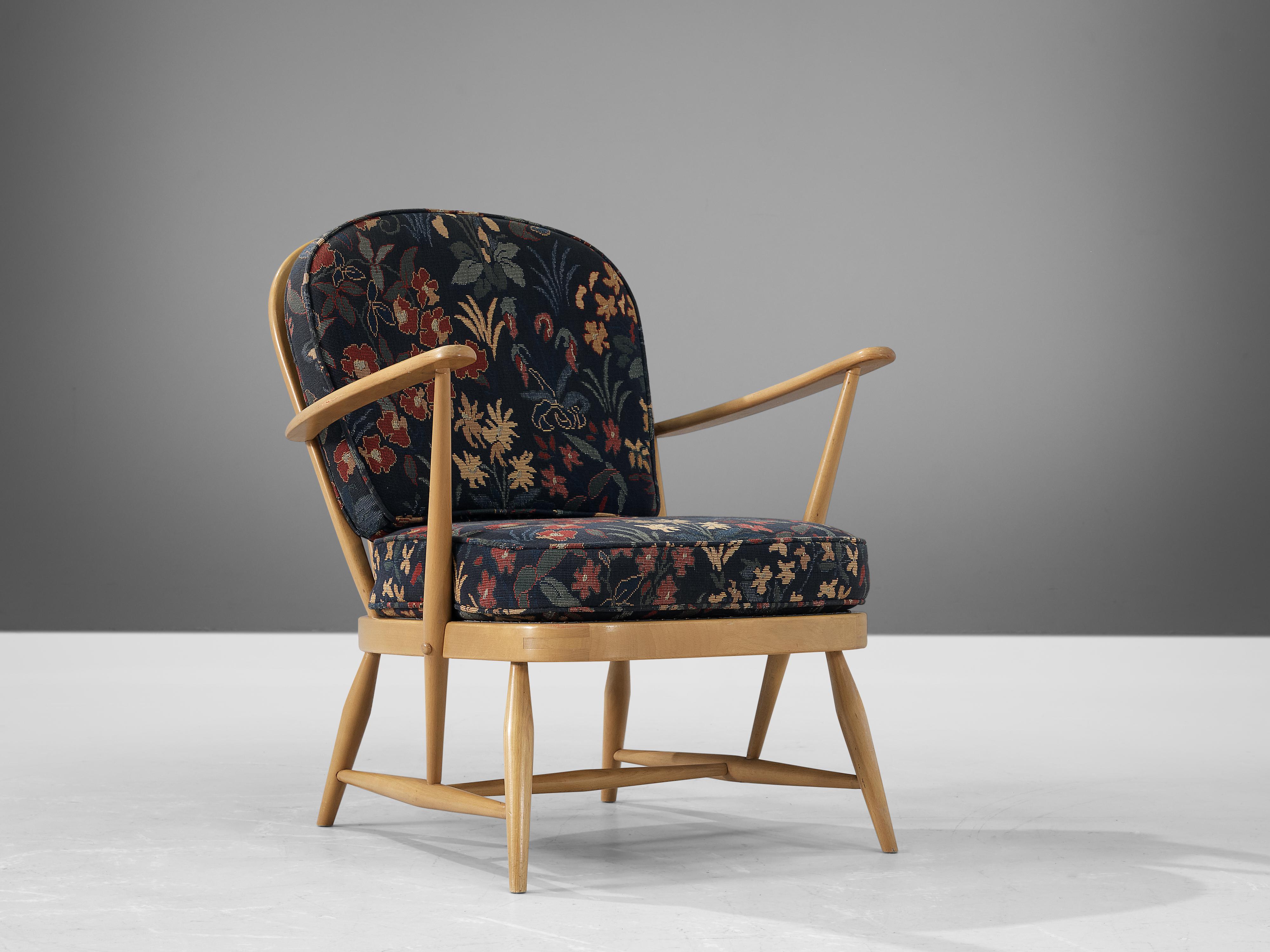 Lucian Ercolani for Ercol, ‘Windsor’ lounge chair, fabric and beech, United Kingdom, 1970s 

The Italian born English designer Lucian Ercolani designed the ‘Windsor’ chair for his own company Ercol in the 1950s, although this particular chair