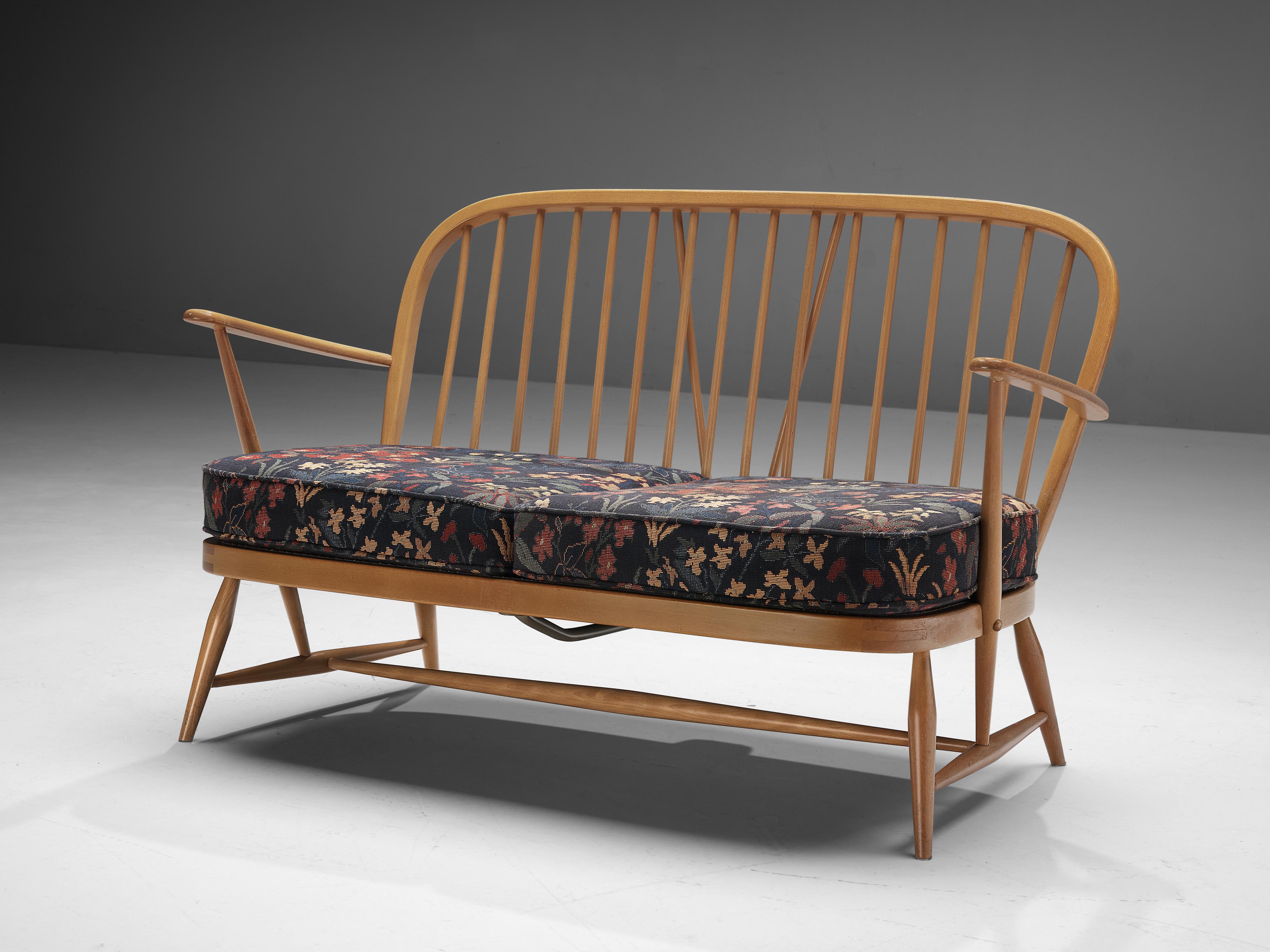 Lucian Ercolani for Ercol, ‘Windsor’ sofa, fabric and beech, United Kingdom, 1970s 

The Italian born English designer Lucian Ercolani designed the ‘Windsor’ sofa for his own company Ercol in the 1950s, although this particular sofa dates from the