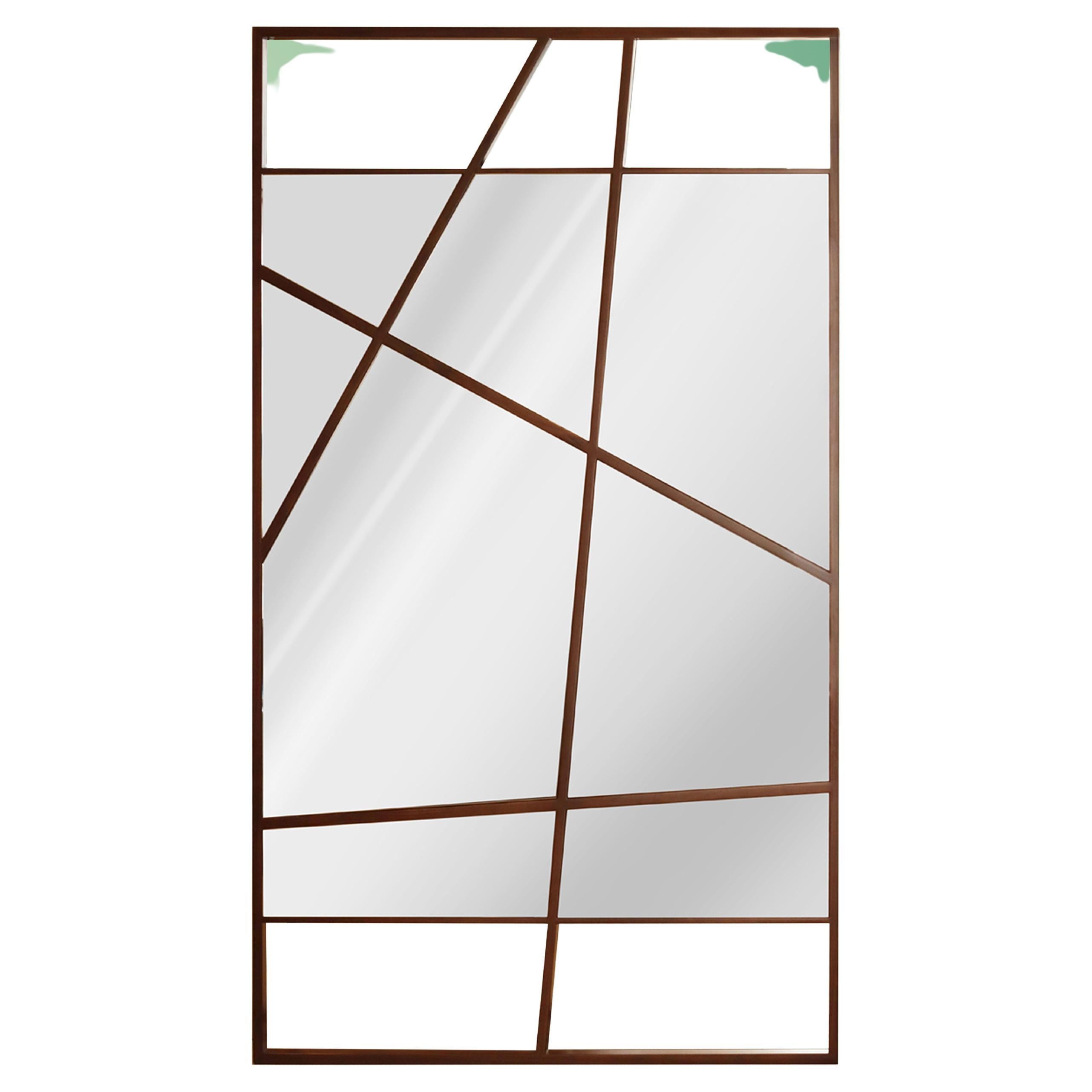 The Lucian mirror is a striking mirror made from multiple pieces of mirror divided by walnut strips framed inside a rectangular shape. This mirror can be left leaning on the wall or hung with a french cleat (provided by us) and is versatile, working