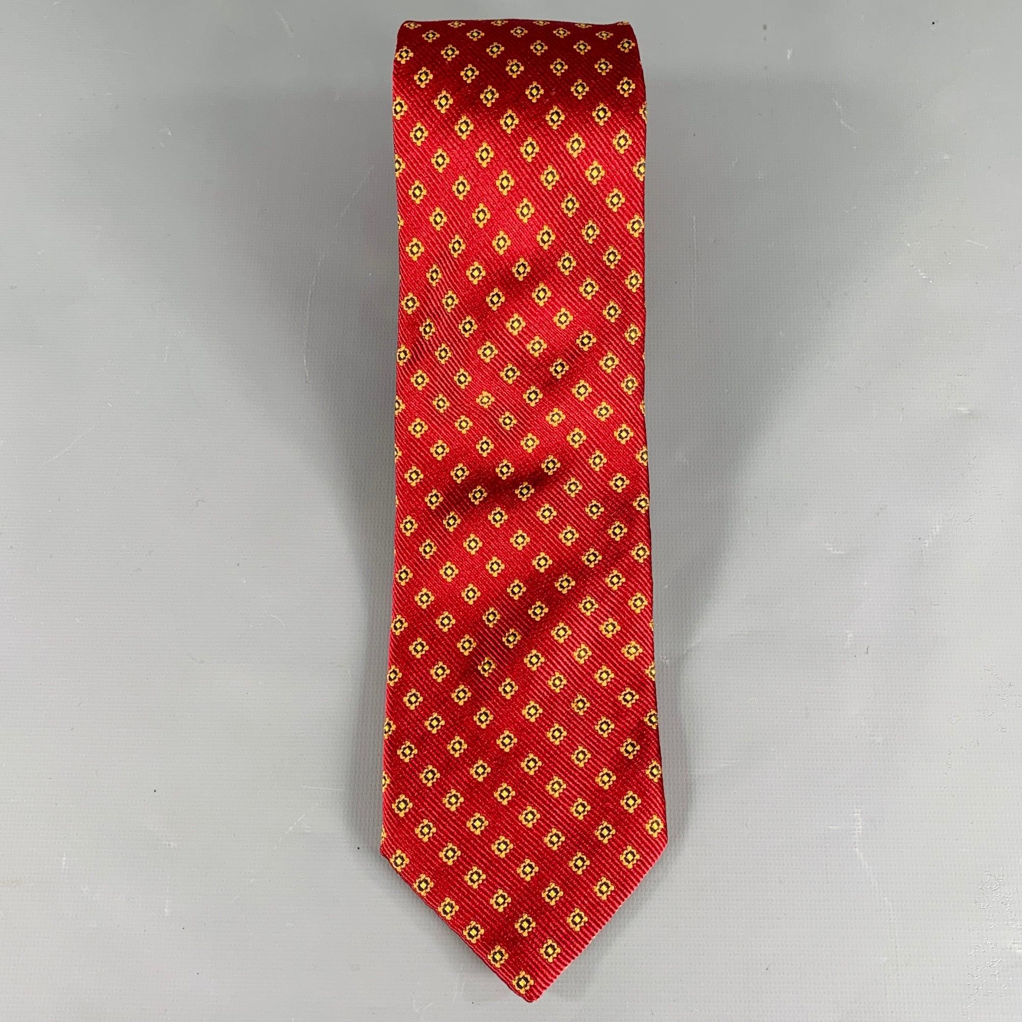 LUCIANO BARBERA necktie
in a burgundy silk twill featuring an orange abstract floral pattern. Made in Italy.Very Good Pre-Owned Condition. 

Measurements: 
  Width: 3.5 inches Length: 62 inches 
  
  
 
Sui Generis Reference: 133914
Category: