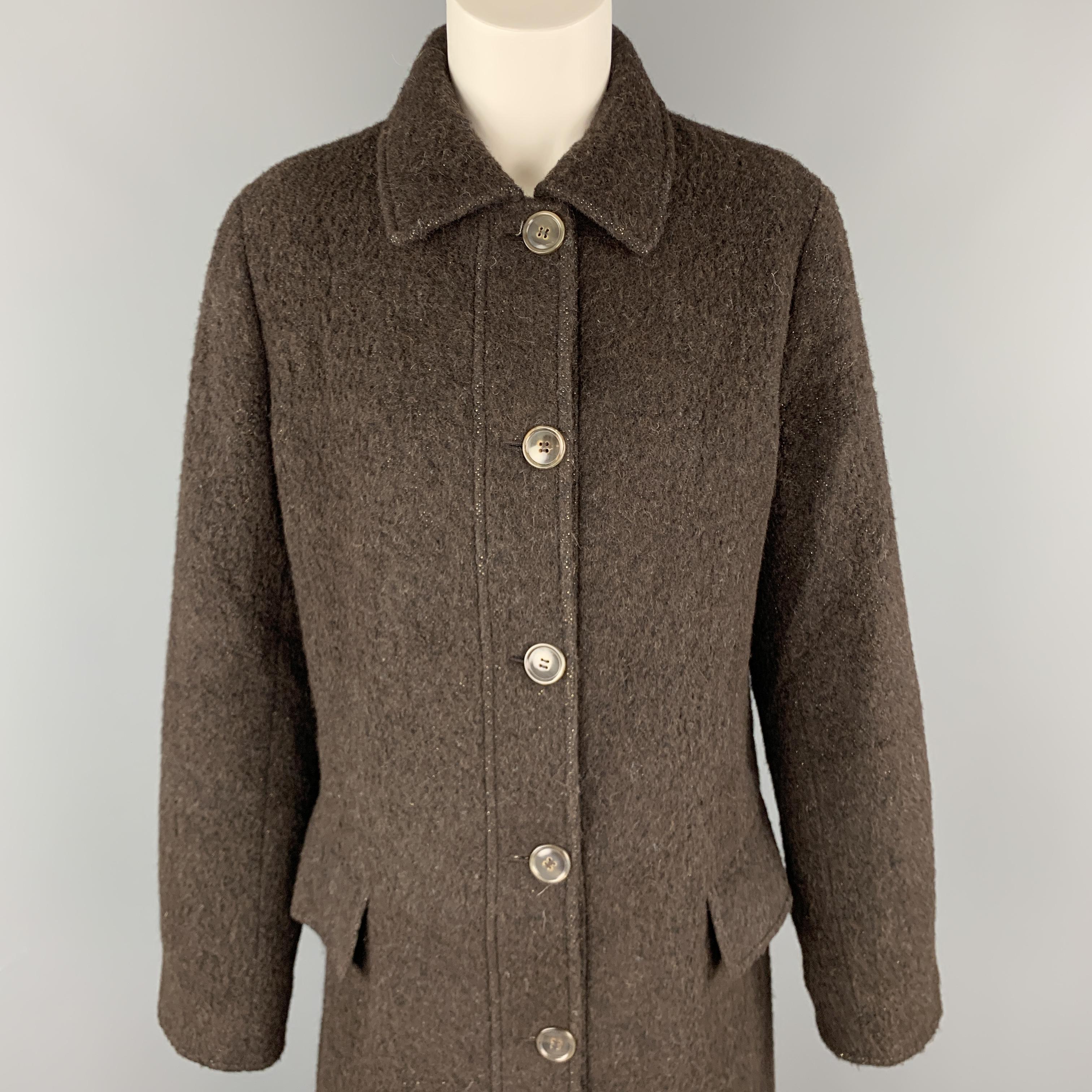 LUCIANO BARBERA coat comes in dark brown alpaca slightly sprakly fabric with a pointed collar, flap pockets, and single breasted button front. Made in Italy.

Excellent Pre-Owned Condition.
Marked: IT 44

Measurements:

Shoulder: 16 in.
Bust: 42