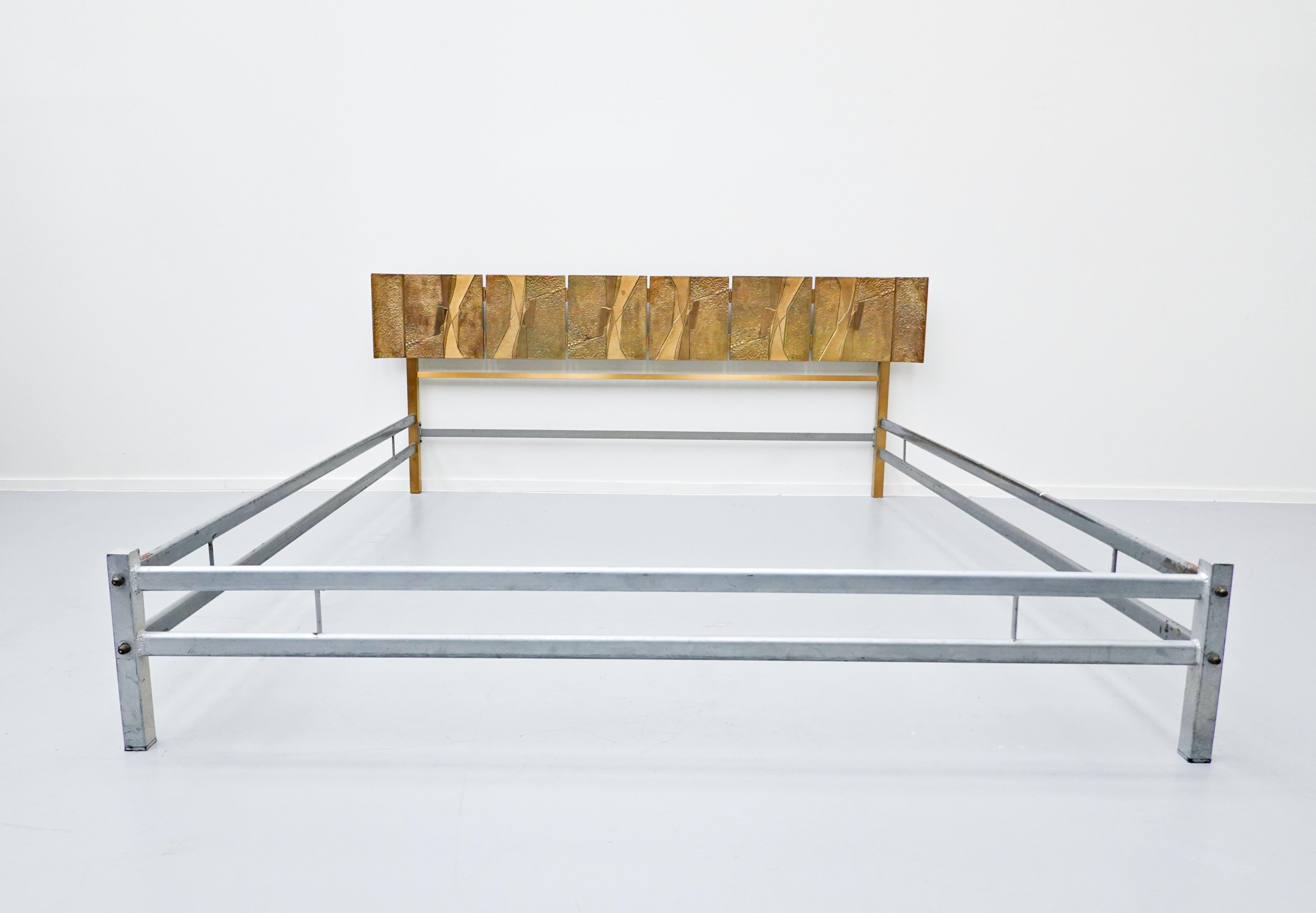 Luciano Frigerio bed with cast bronze panels, Italy, 1960s.