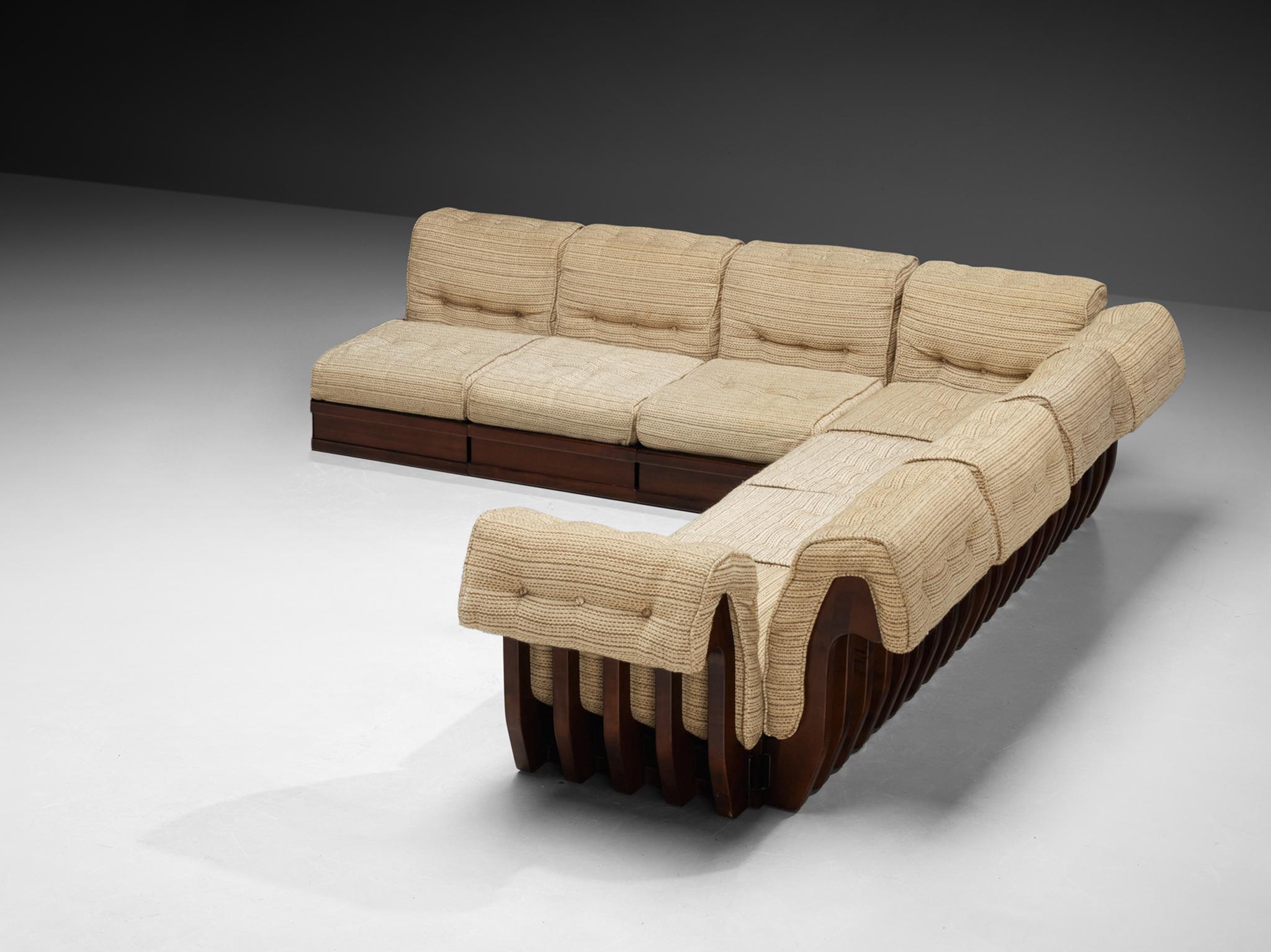 Luciano Frigerio for Frigerio Di Desio, 'Can Can' sectional sofa with side tables, beech, fabric, glass, Italy, 1960s

This large living room set known as 'Can Can' is designed by Luciano Frigerio and dates back the 1960s. Characterized by its