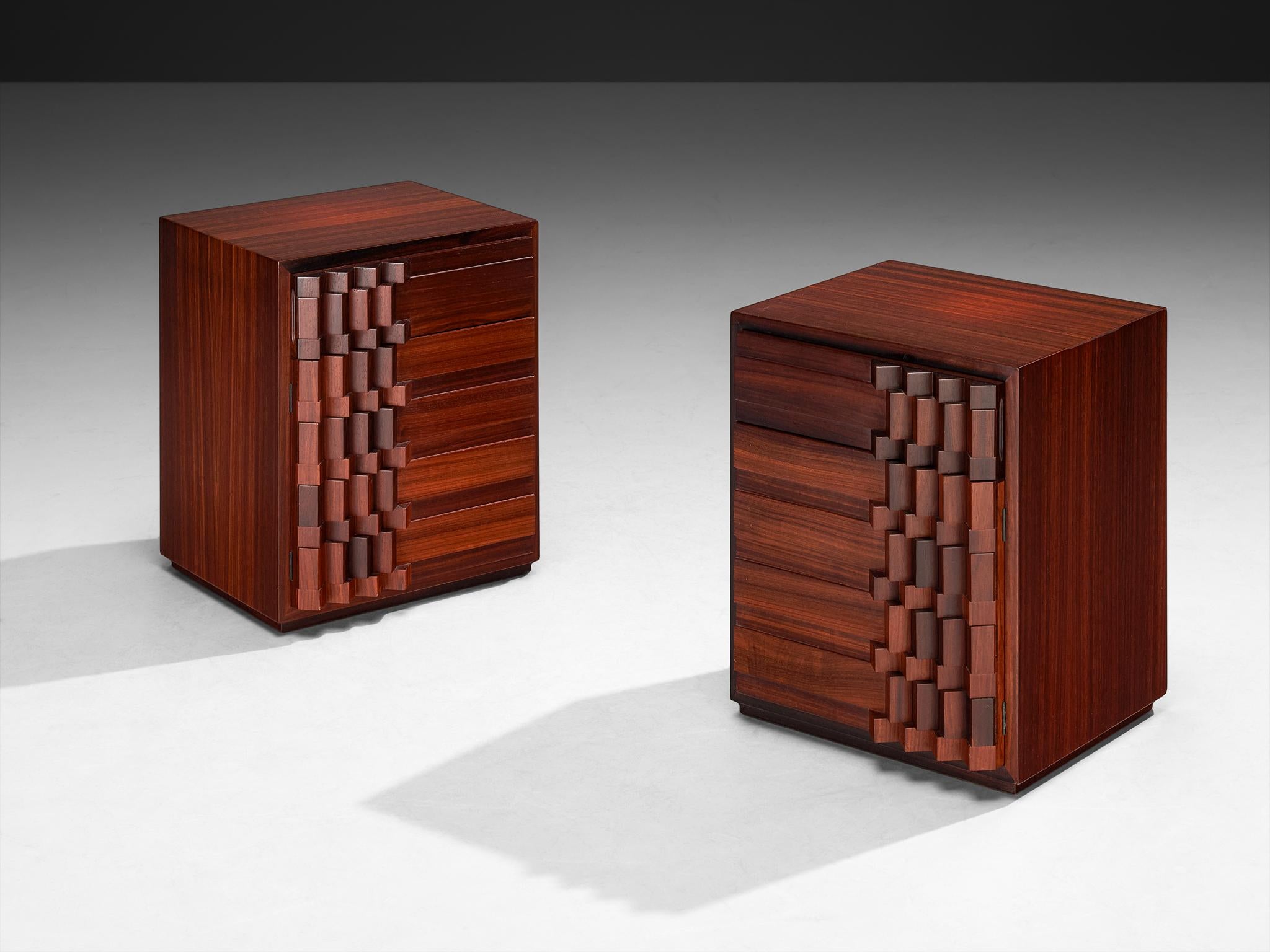 Luciano Frigerio, 'Diamante' nightstands, padouk, Italy, 1970s

This remarkable pair of nightstands by Italian designer Luciano Frigerio captures the spirit of 1970s design. The front features an intricate geometric pattern carved in relief, with