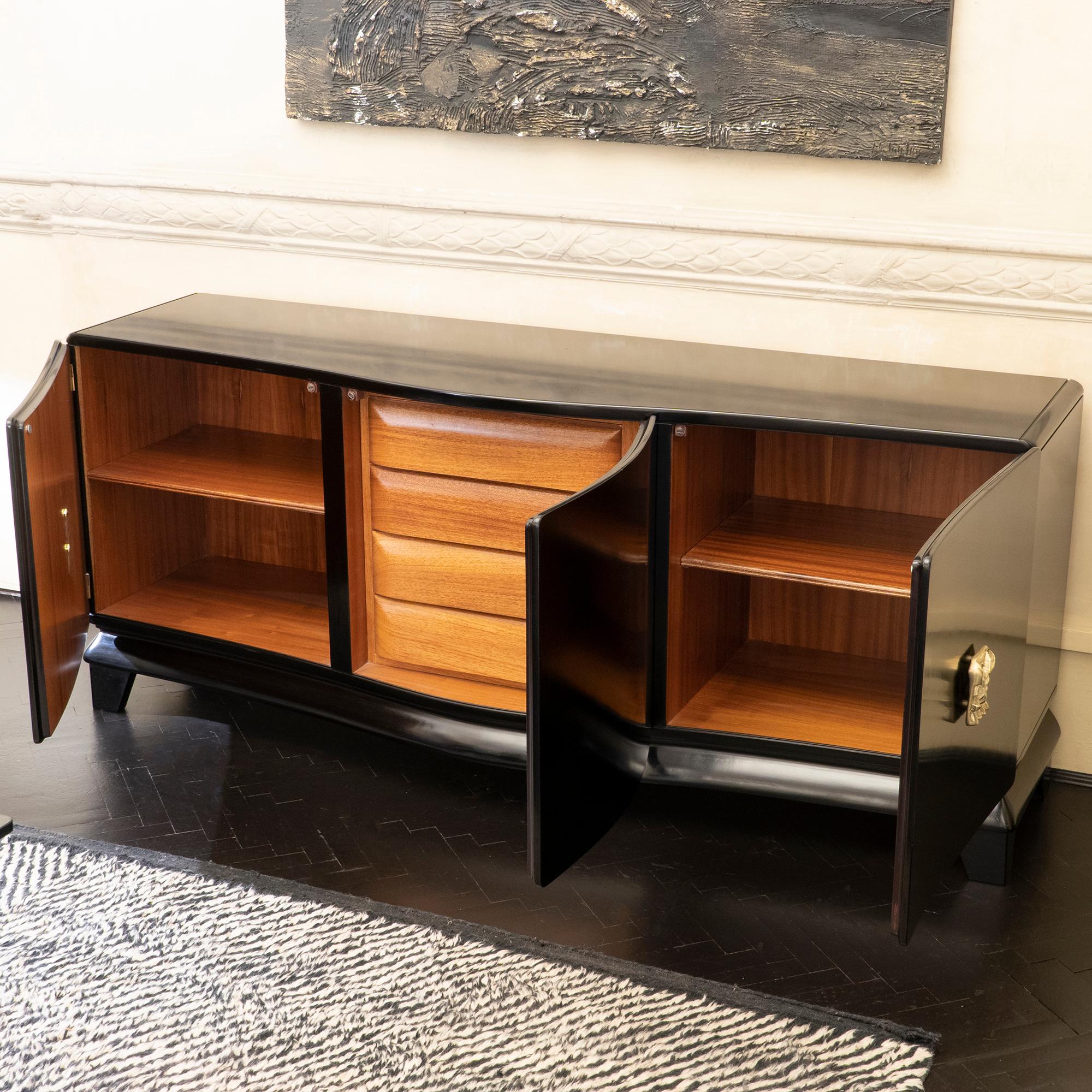 Ebonized palisander sideboard by Luciano Frigerio, central four drawers and two side section with one removable shelve, new custom sculptural brass handle, Italy, 1966.