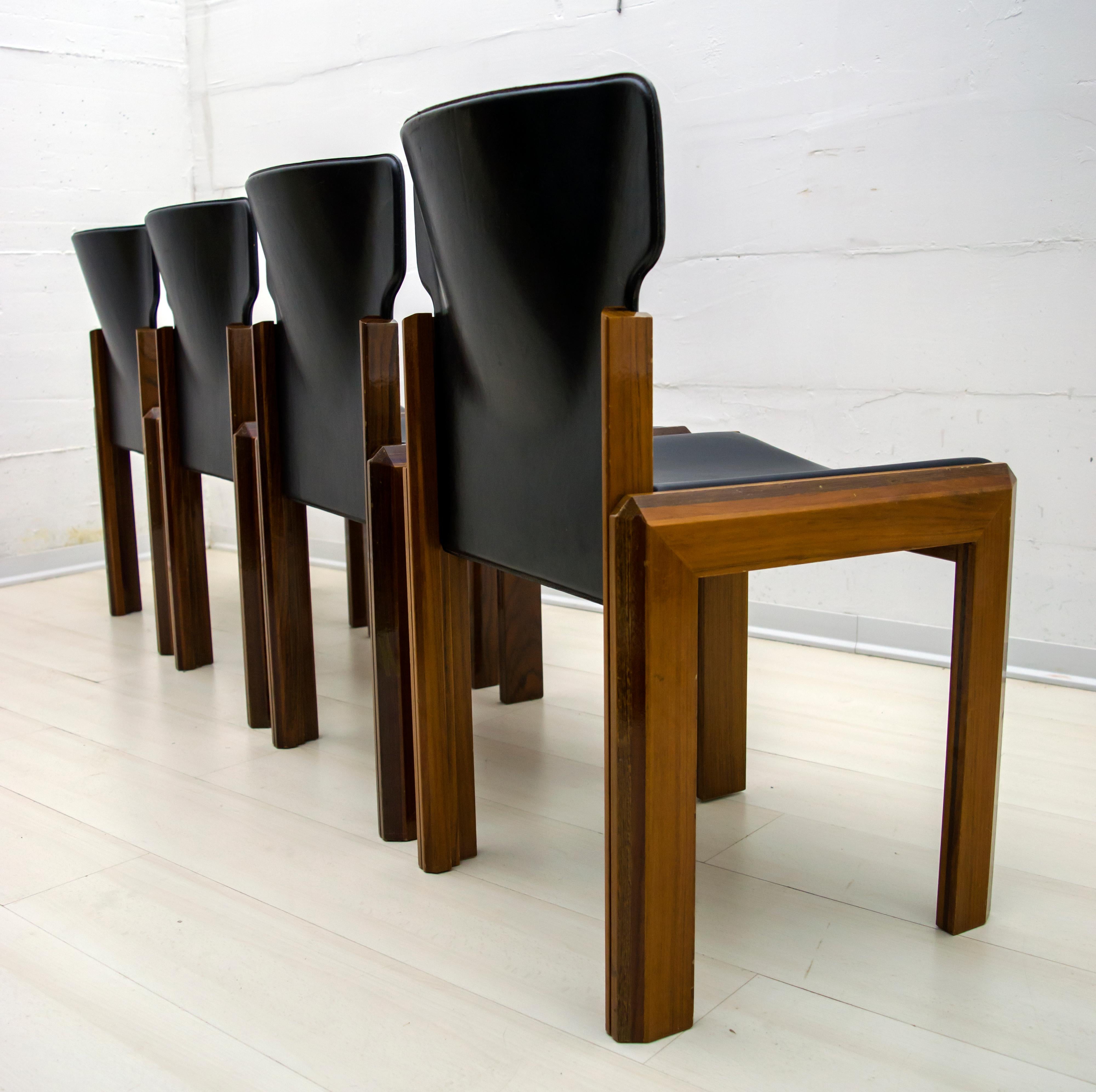These dining chairs were designed by Luciano Frigerio. The chairs are veneered with various woods: Walnut, Mahogany, Padouk, Wenge.
There is also a table combined with chairs, always produced by Frigerio

Luciano Frigerio was born in Desio in 1928.