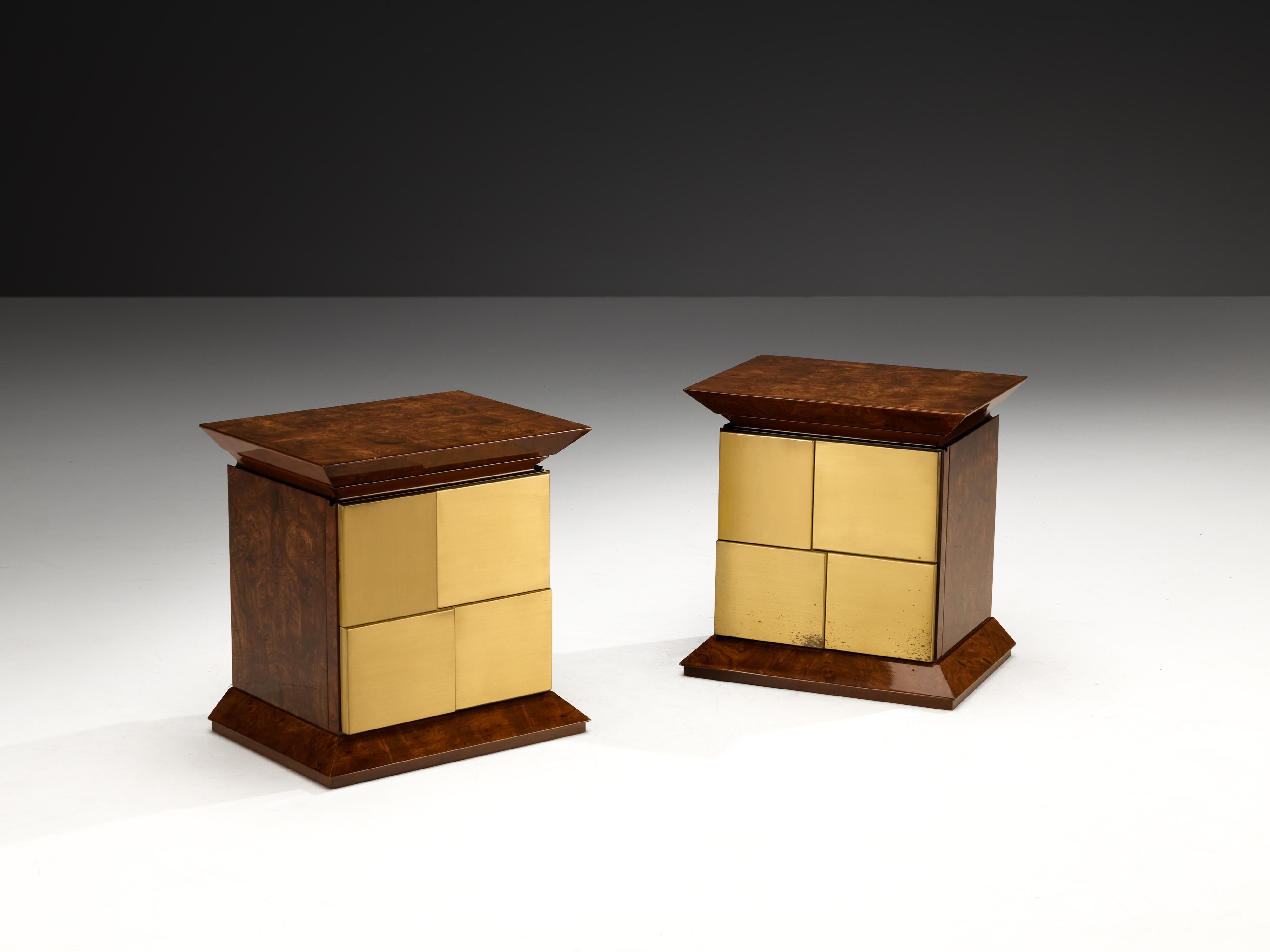 Luciano Frigerio, nightstands, brass, lacquered elm burl, Italy, 1970s

These exquisite nightstands, created by the creative Italian designer Luciano Frigerio, exemplify the aesthetic sensibilities that prevailed during the 1970s. The front facade