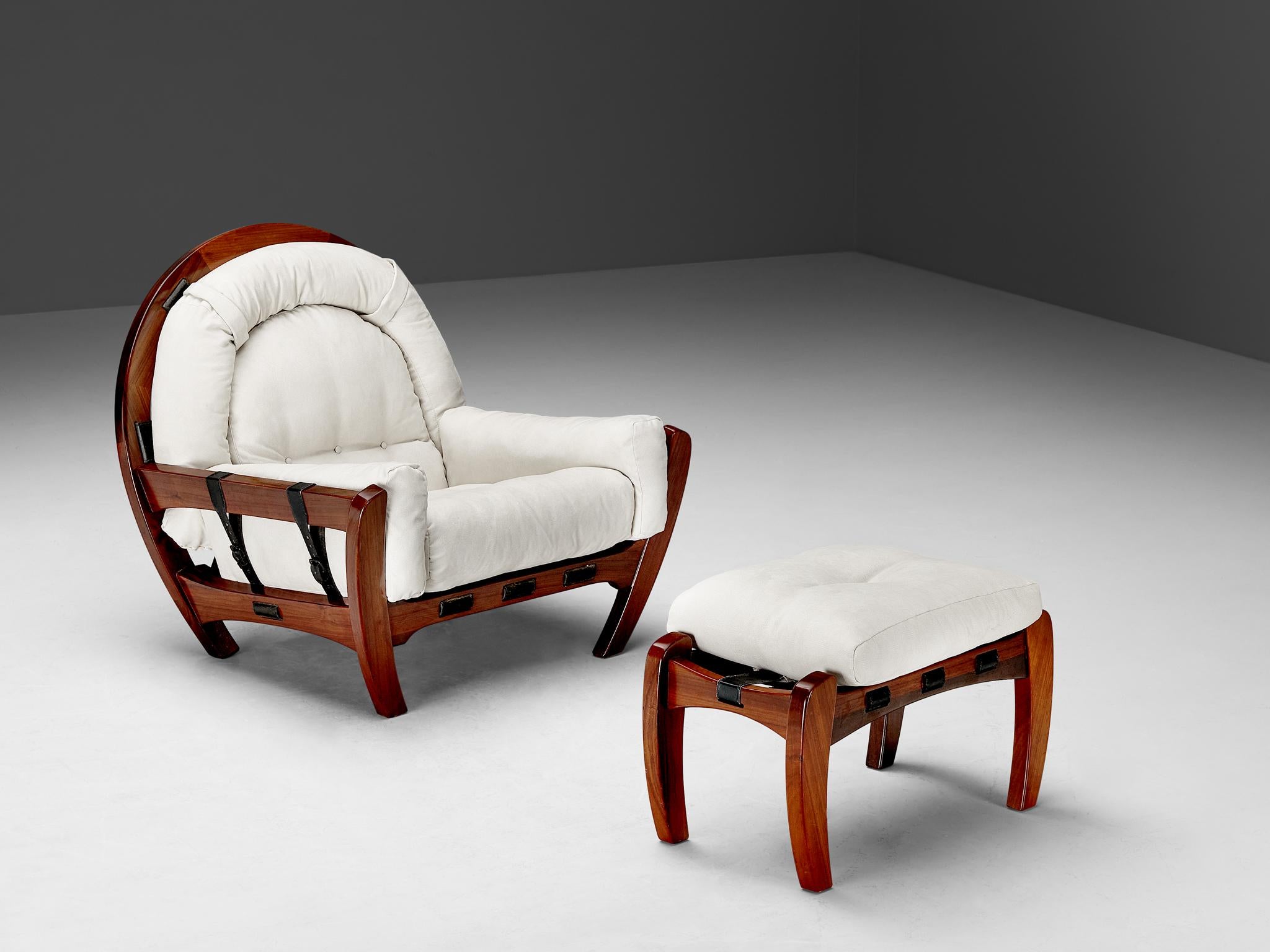 Luciano Frigerio, 'Rancero' lounge chair with ottoman, alcantara, wood, metal, Italy, 1970s

Crafted by Italian designer Luciano Frigerio in the 1970s, this monumental lounge chair and its complementary ottoman will add a touch of vibrancy to any