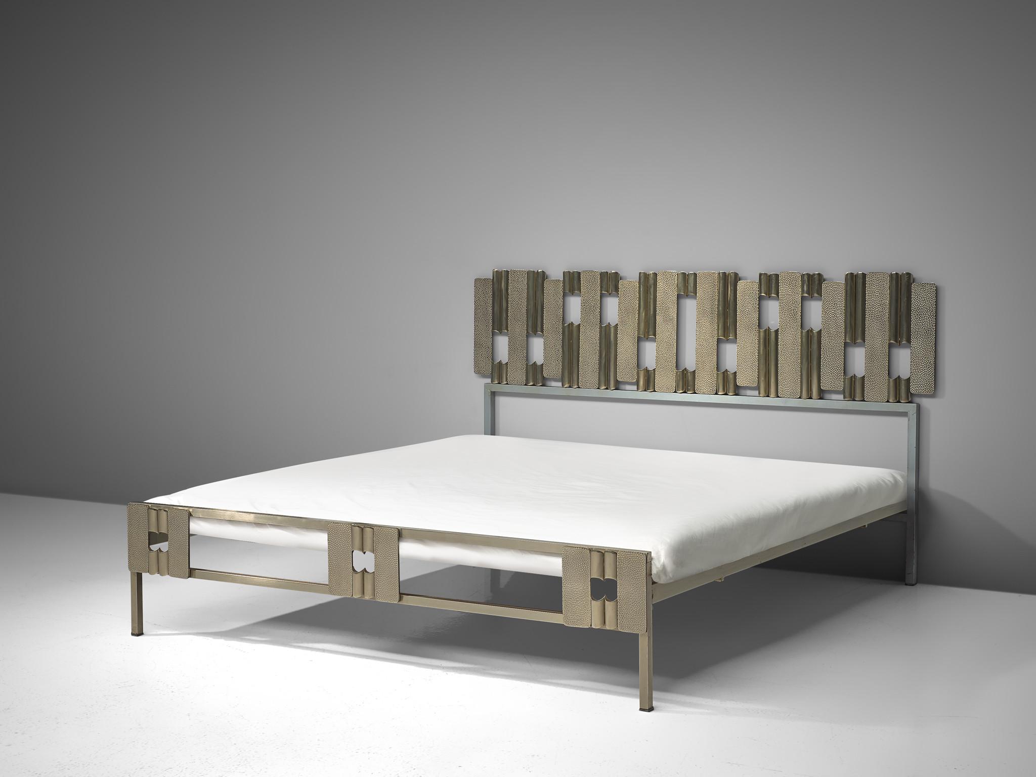 Luciano Frigerio, bed with headboard, hammered steel, Italy, 1970s

Beautiful bed by Italian sculptor and artist Luciano Frigerio. This Brutalist inspired bed was produced circa 1970 and features a stunning headboard consisting of a variety in