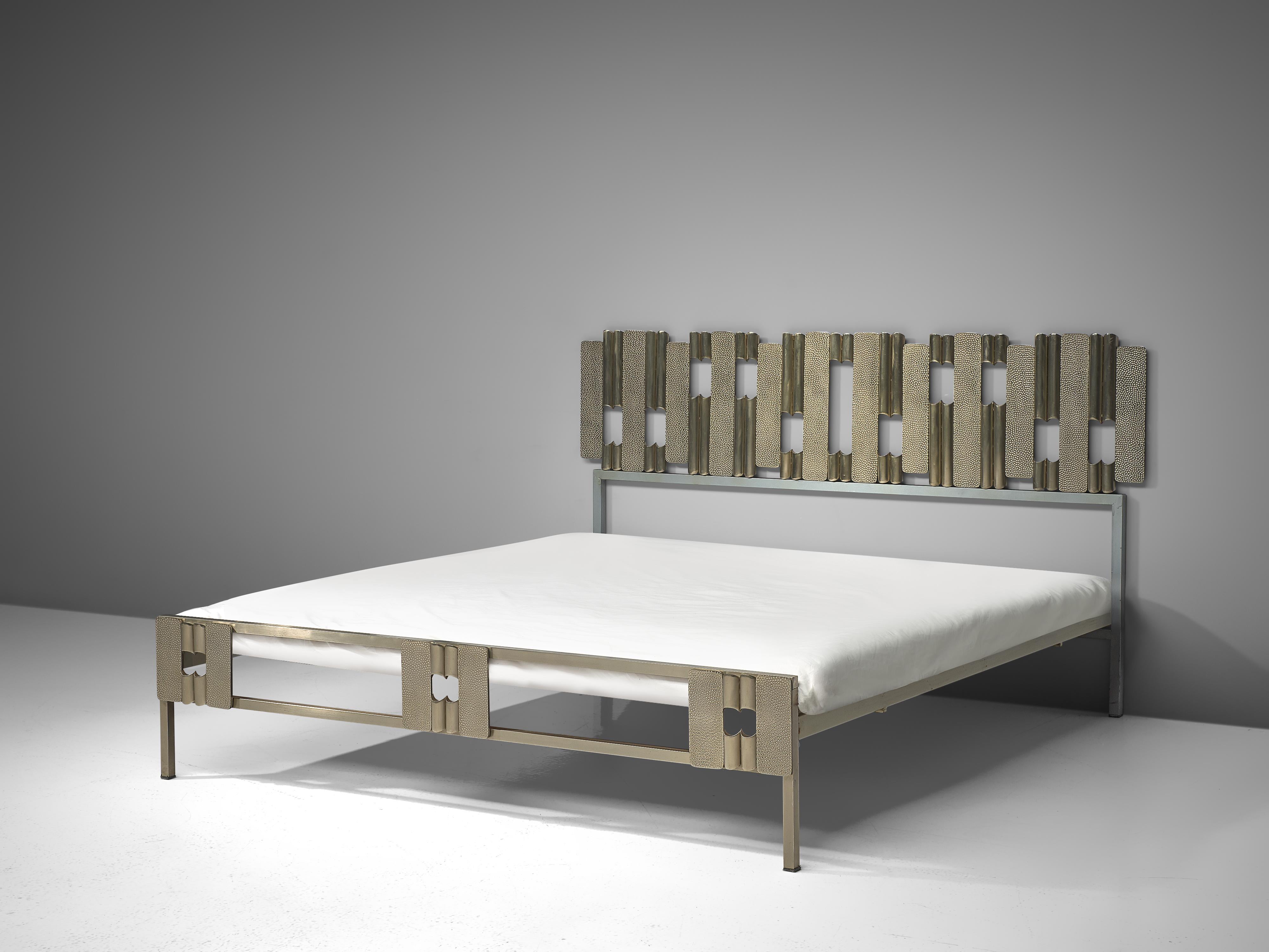 Luciano Frigerio, bed with headboard, steel, Italy, 1970s

Beautiful bed by Italian sculptor and artist Luciano Frigerio. This Brutalist inspired bed features a stunning headboard consisting of a variety in vertical slats. These slats are both