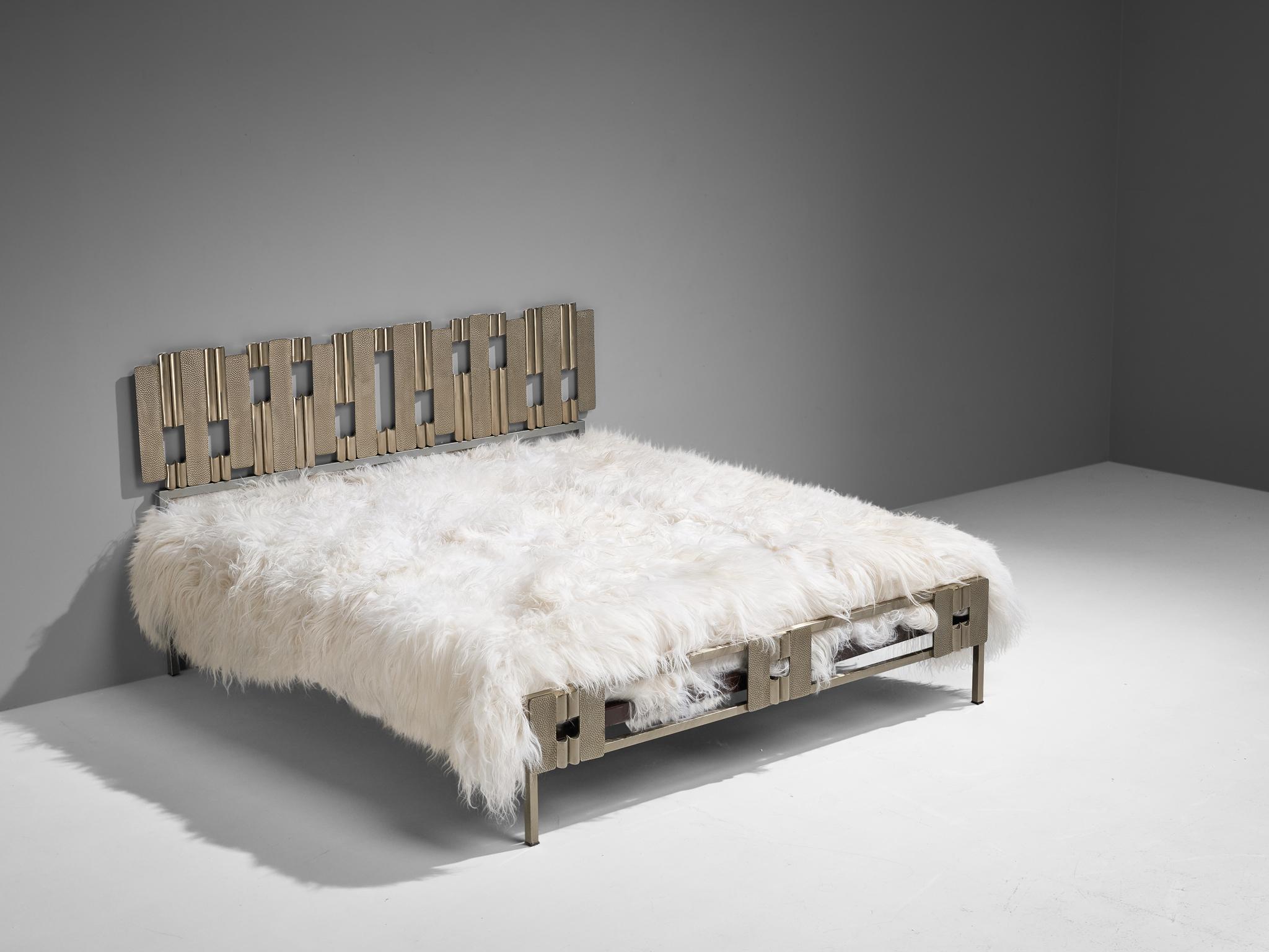 Luciano Frigerio, bed with headboard, steel, Italy, 1970s

Beautiful bed by Italian sculptor and artist Luciano Frigerio. This Brutalist inspired bed features a stunning headboard consisting of a variety of vertical slats. These slats are both