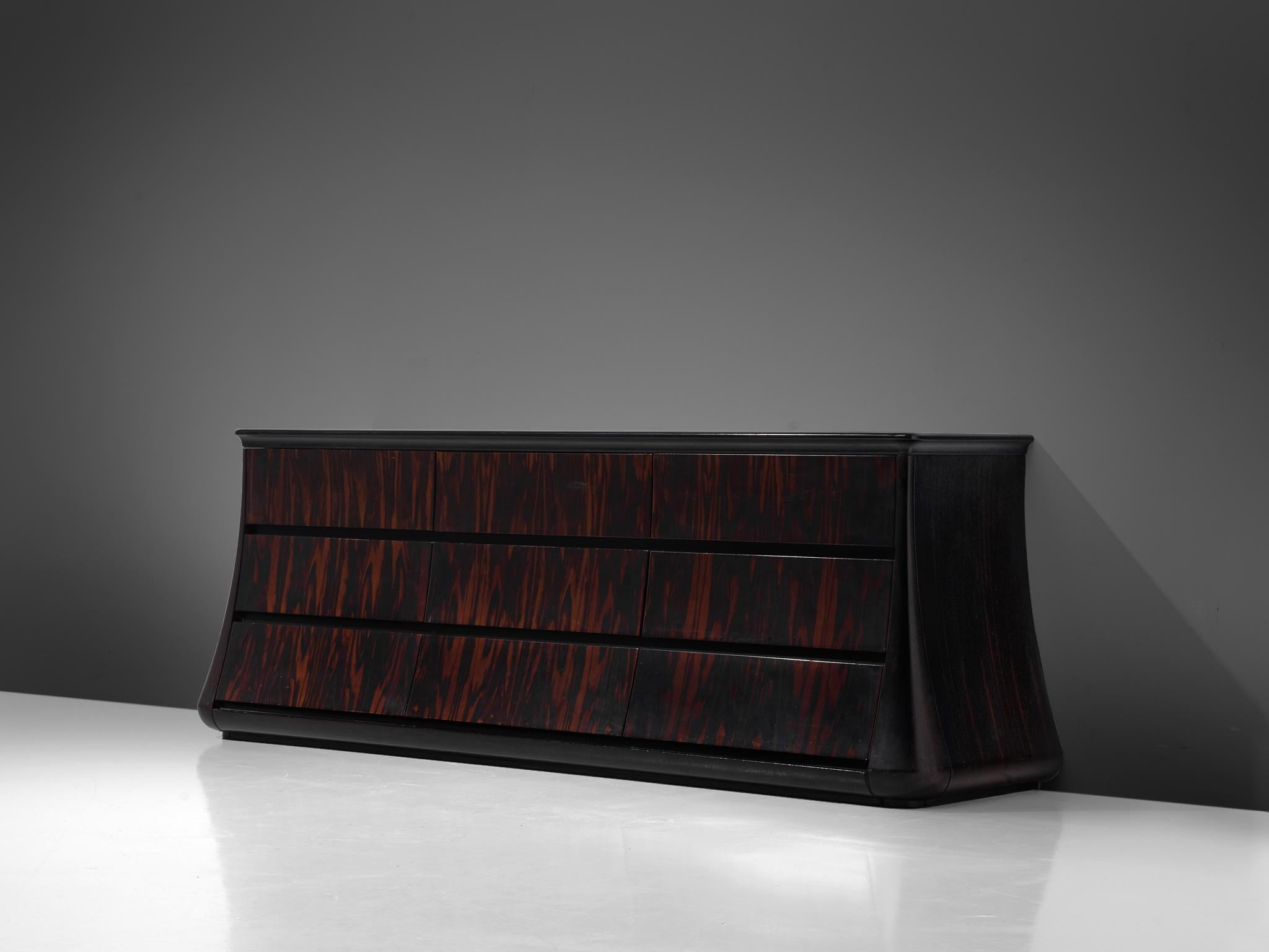 Luciano Figerio for Frigerio Di Desio, sideboard, Macassar ebony, Italy, circa 1966.

Chest of drawers designed by the Italian Luciano Frigerio. The cabinet is executed in rare Macassar ebony wood, which is known for its almost black color with warm