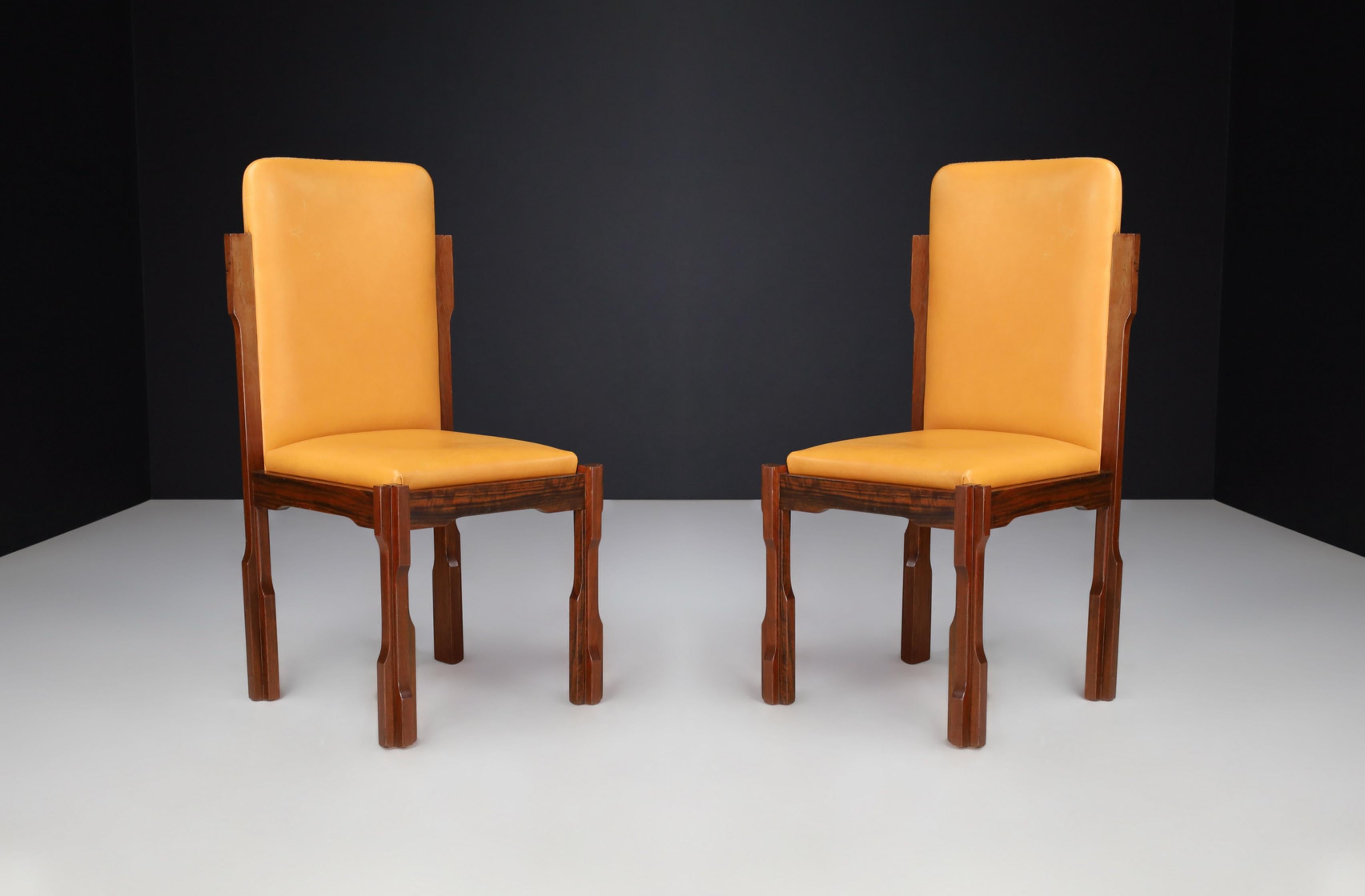 Luciano Frigerio Walnut and Leather Desk Chairs, Italy 1970s.
These chairs, part of the 
