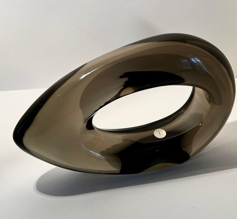 Fabulous large and chunky Murano glass sculpture by Luciano Gaspari for Salviati, circa 1970s in smoked glass. Dynamic sculpture with magnificent scale and great weight in an ovoid shape with an open centre. The original Salviati sticker is still