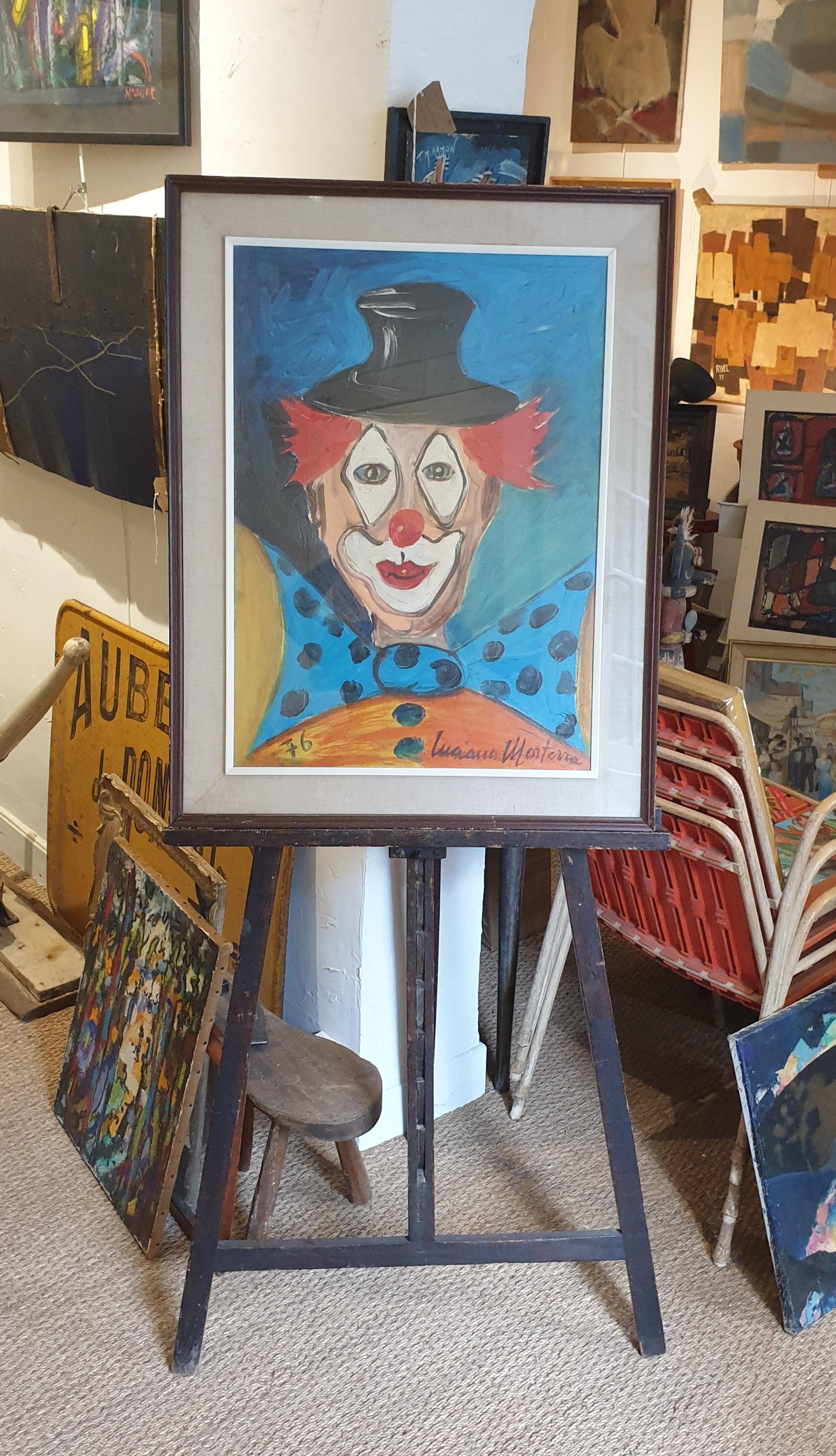 Expressionist oil on canvas portrait of a clown by Italian artist Luciano Morterra. Signed bottom right and dated 1976 to the bottom left and presented in a period frame under glass. There is also a trade label for a gallery in Milan to the back