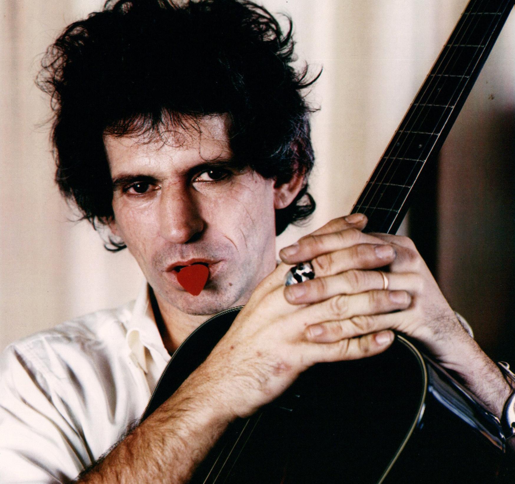 Luciano Viti Portrait Photograph - Keith Richards Posed with Guitar Pick in Mouth Vintage Original Photograph