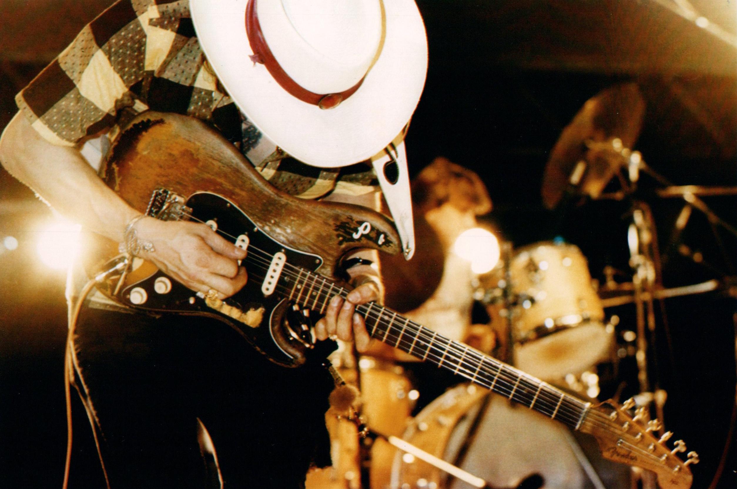 Luciano Viti Portrait Photograph - Stevie Ray Vaughan in Action Vintage Original Photograph