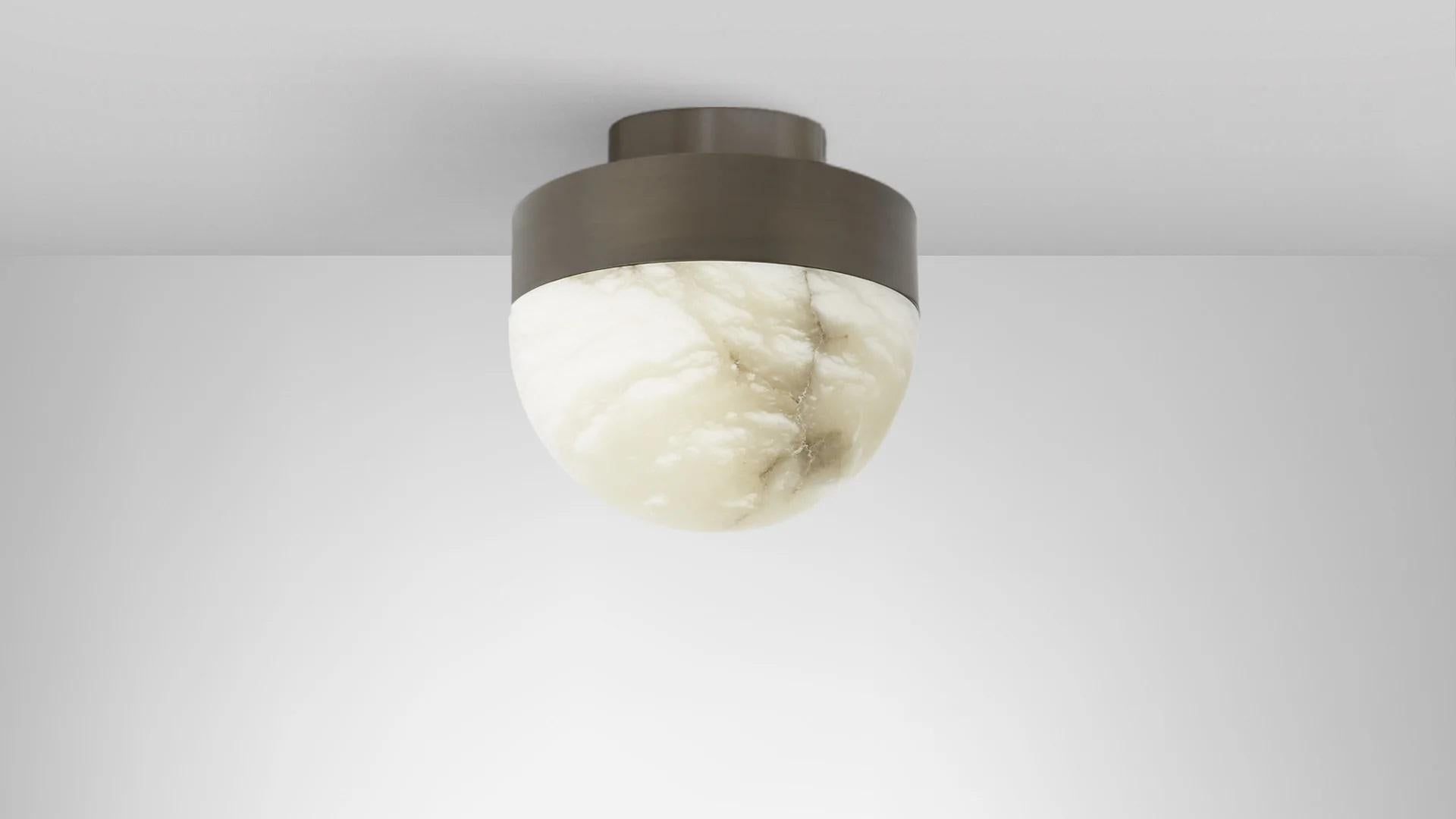 Lucid 300 flush lamp by CTO Lighting.
Materials: honed alabaster with satin brass base.
Also available in honed alabaster with bronze base.
Dimensions: H 28 x W 30 cm

All our lamps can be wired according to each country. If sold to the USA it