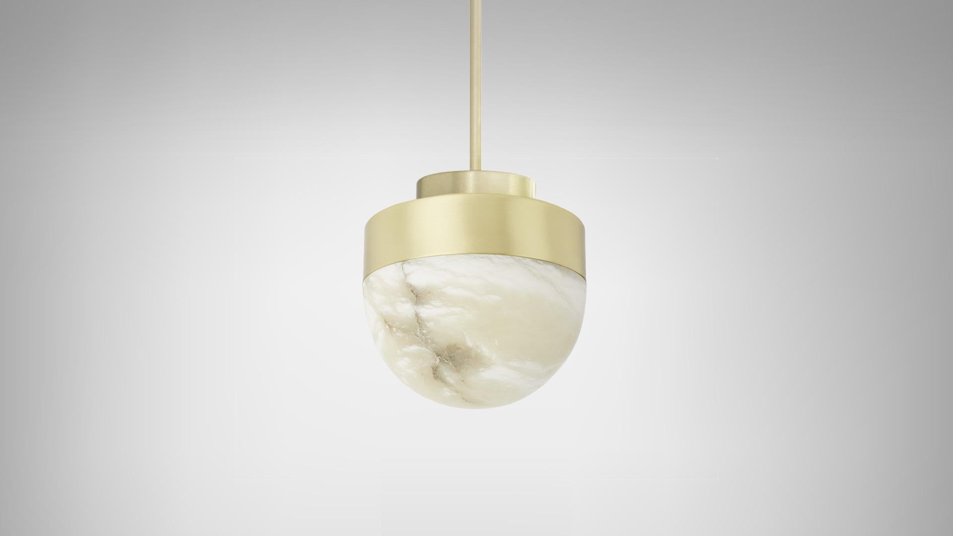 Lucid 300 pendant by CTO lighting
Materials: honed alabaster with satin brass base.
Also available in honed alabaster with bronze base.
Dimensions: H 33 x W 30 cm

All our lamps can be wired according to each country. If sold to the USA it will