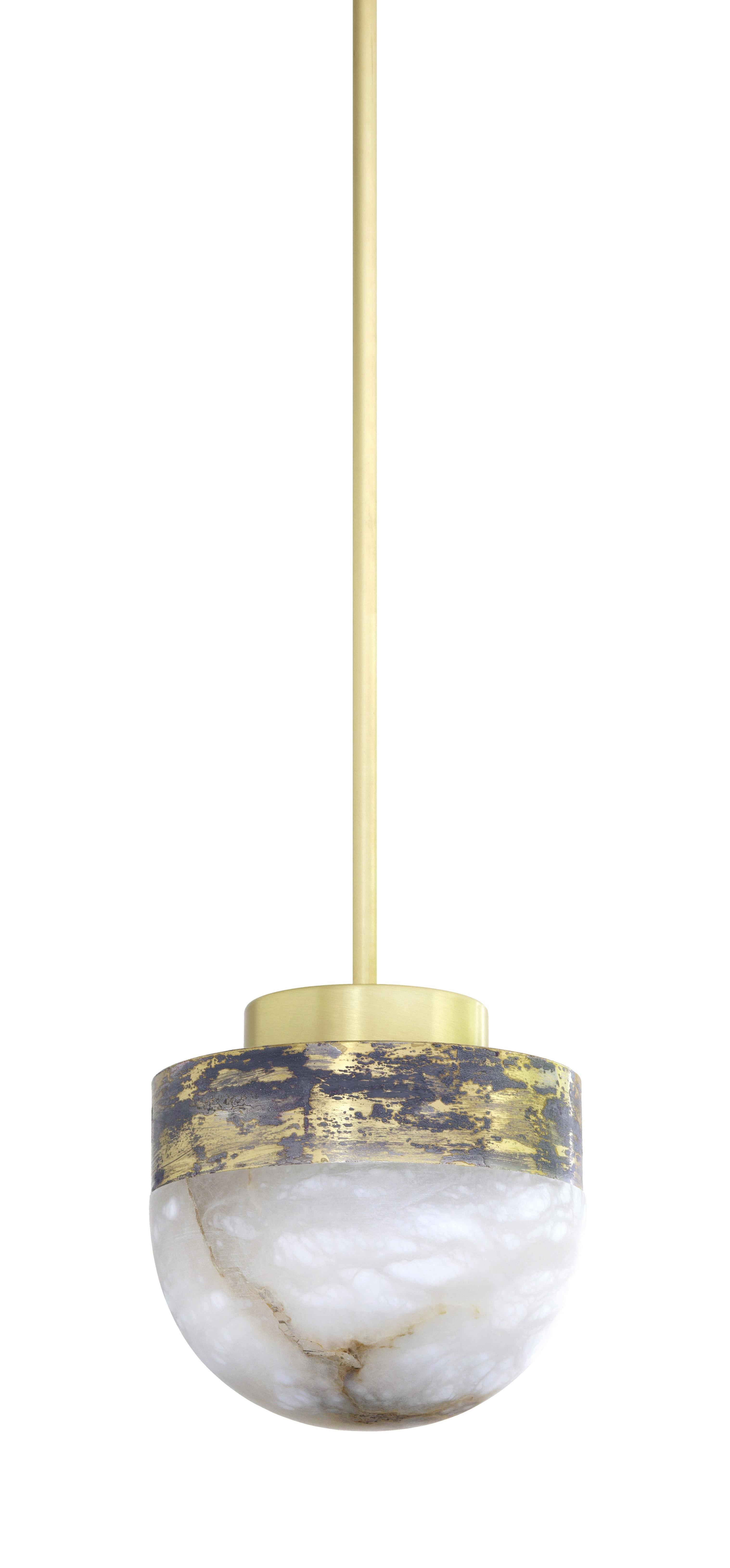 Lucid 300 Pendant by CTO Lighting
Materials: honed alabaster with oxidised silvered brass base satin brass drop rod and ceiling box.
Dimensions: H 33 x W 30 cm

All our lamps can be wired according to each country. If sold to the USA it will be