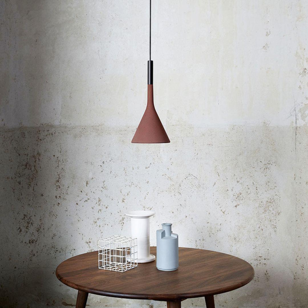 Lucidi & Pevere ‘Aplomb’ concrete pendant lamp in brick red for Foscarini

Designed by Lucidi & Pevere and produced by Foscarini, the Italian lighting firm founded in Venice on the legendary island of Murano, where generations of master craftsman