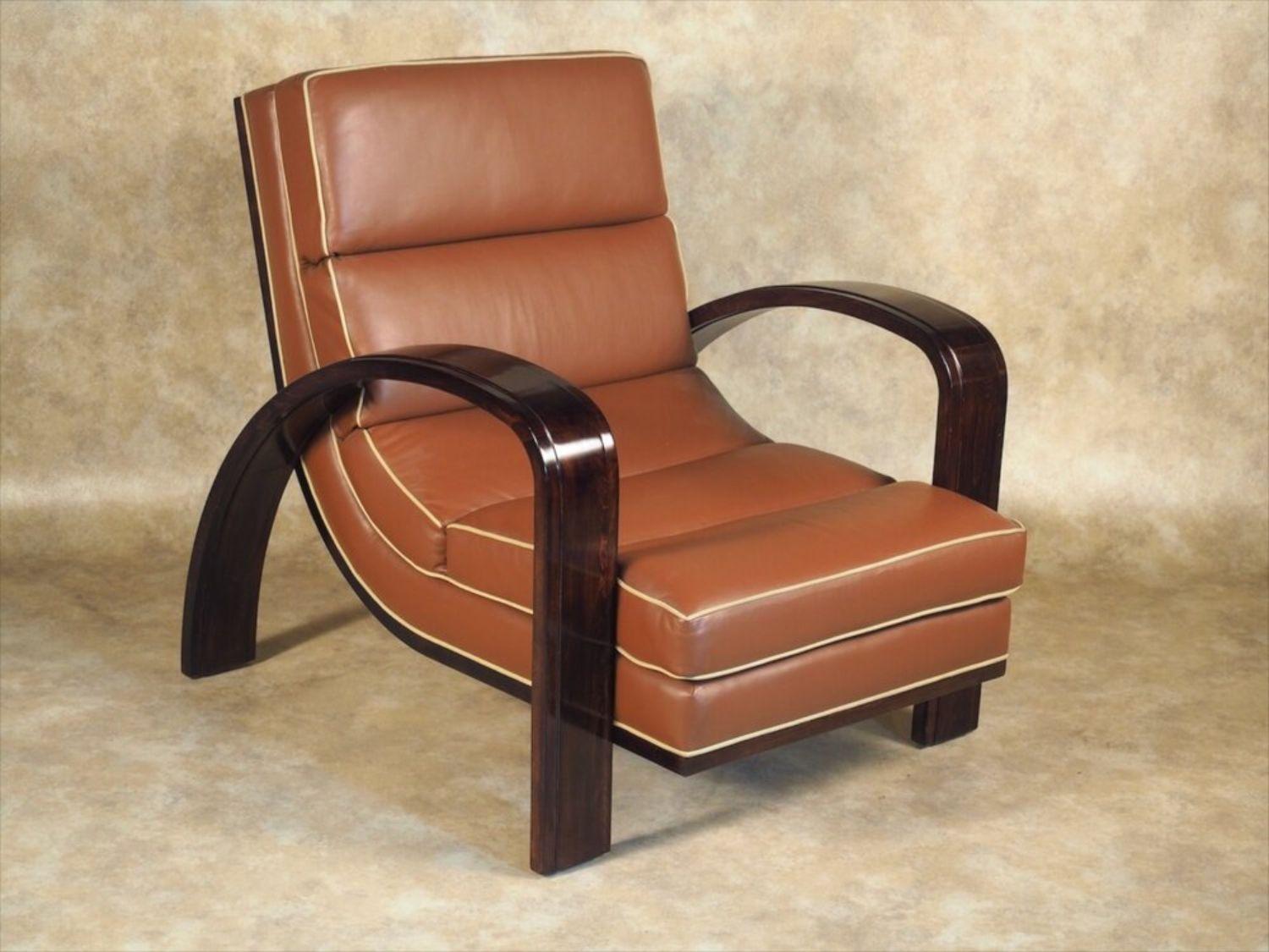 French Modernist armchair. Model exhibited at the 1929 Salon des Artistes Decorateurs, Paris, France. Pictured in period documentation. Beech frame and leather upholstering.