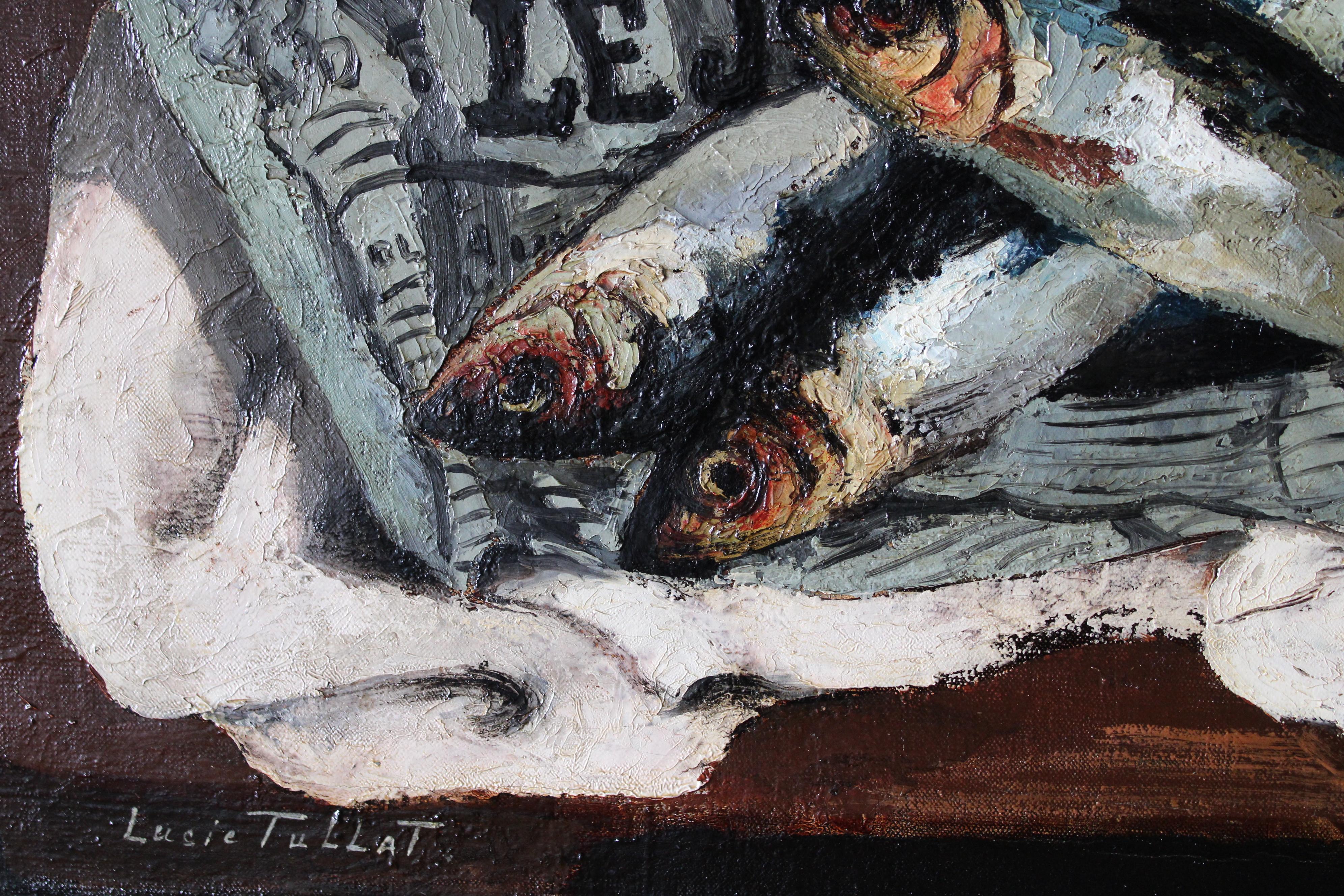Rare vintage oil painting of sardines on French newspaper by French artist Lucie Tullat (1895-1984).  A chiaroscuro painting, where the darkness of the background focuses your eye on the detailing of the fish in the fore which the artist has carved
