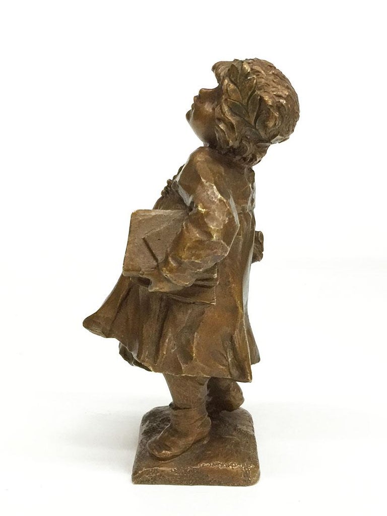 Lucien Alliot French small bronze figurine

Lucien Charles Eduoard Alliot (1877-1967)
The sculptor was born in 1877 in Paris, France
An early 20th Century bronze statue of a girl with a laurel wreath on her head and books in both arms. A medal