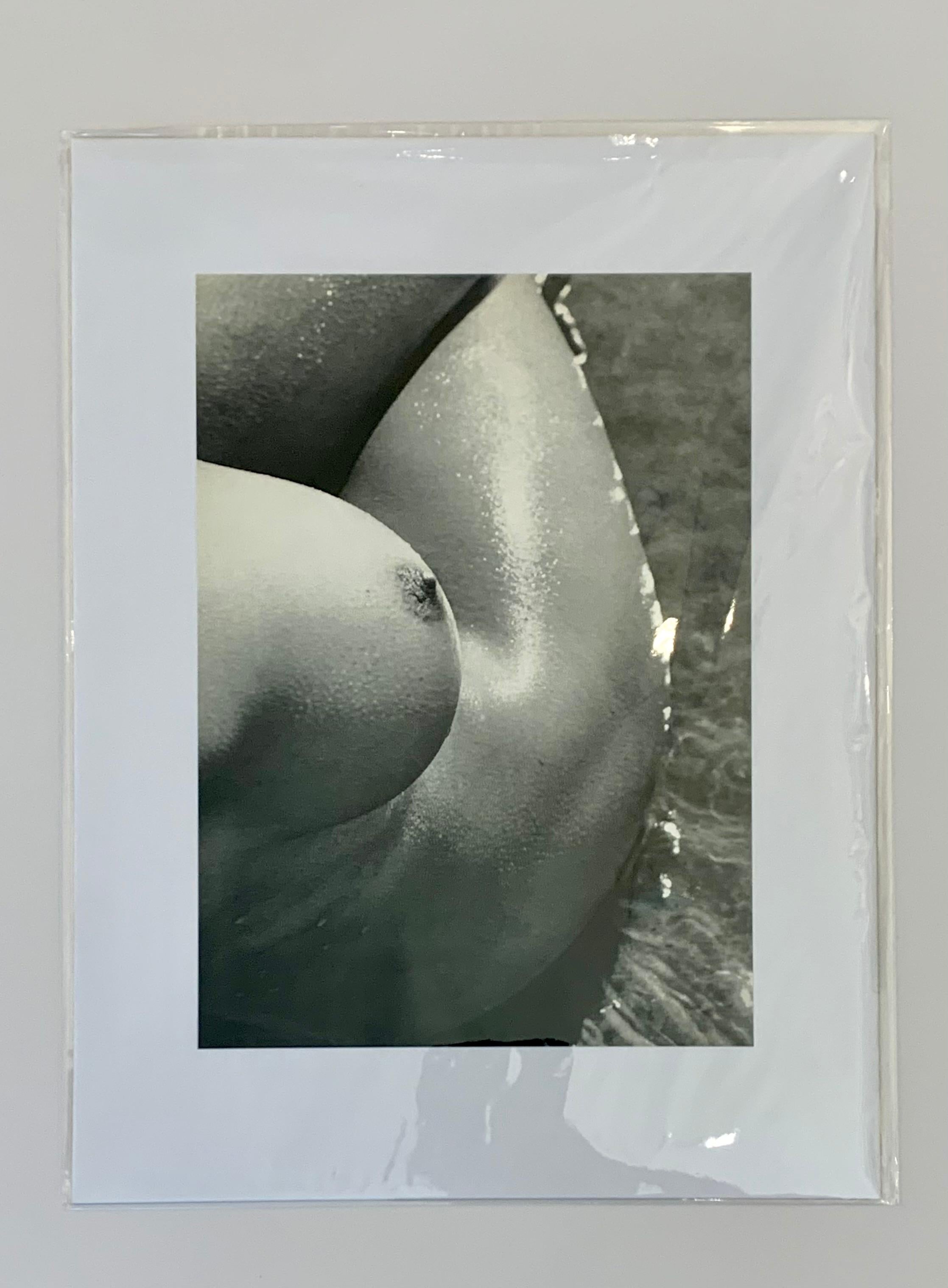 Nude Female Study 1968
by Lucien Clergue

A curved, sculptured shot of a nude female torso and breast captured by Lucien Clergue 

Unframed
Matted
Overall size : 12 x 16