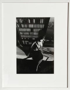Nude on a Ledge, Photograph by Lucien Clergue