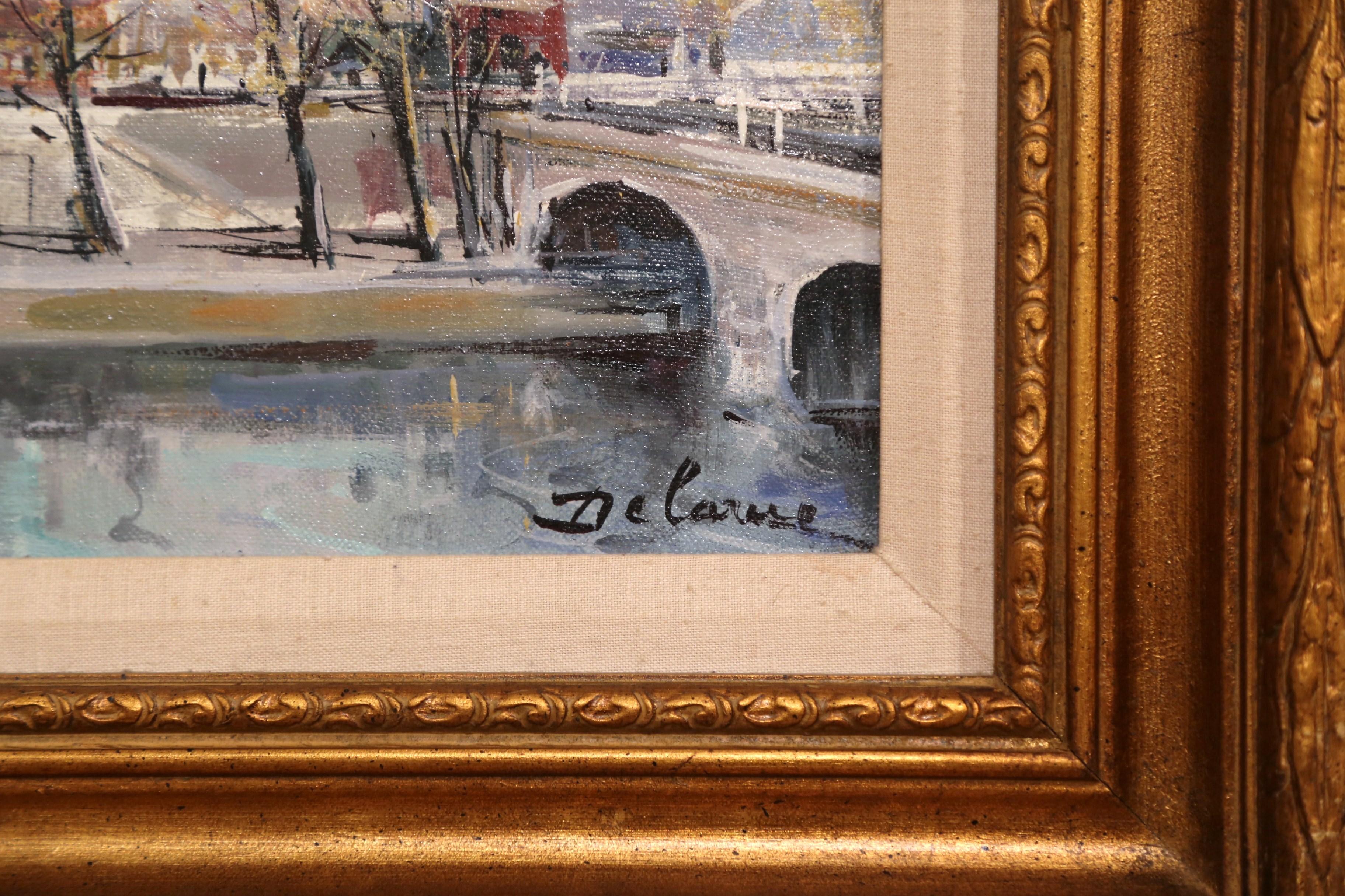 Keep a view of Paris in your home with this oil on canvas painting by French painter, Lucien Delarue. Set inside a carved gilt frame, this detailed, architectural painting is signed in lower right corner by the artist. The art work depicts a famous