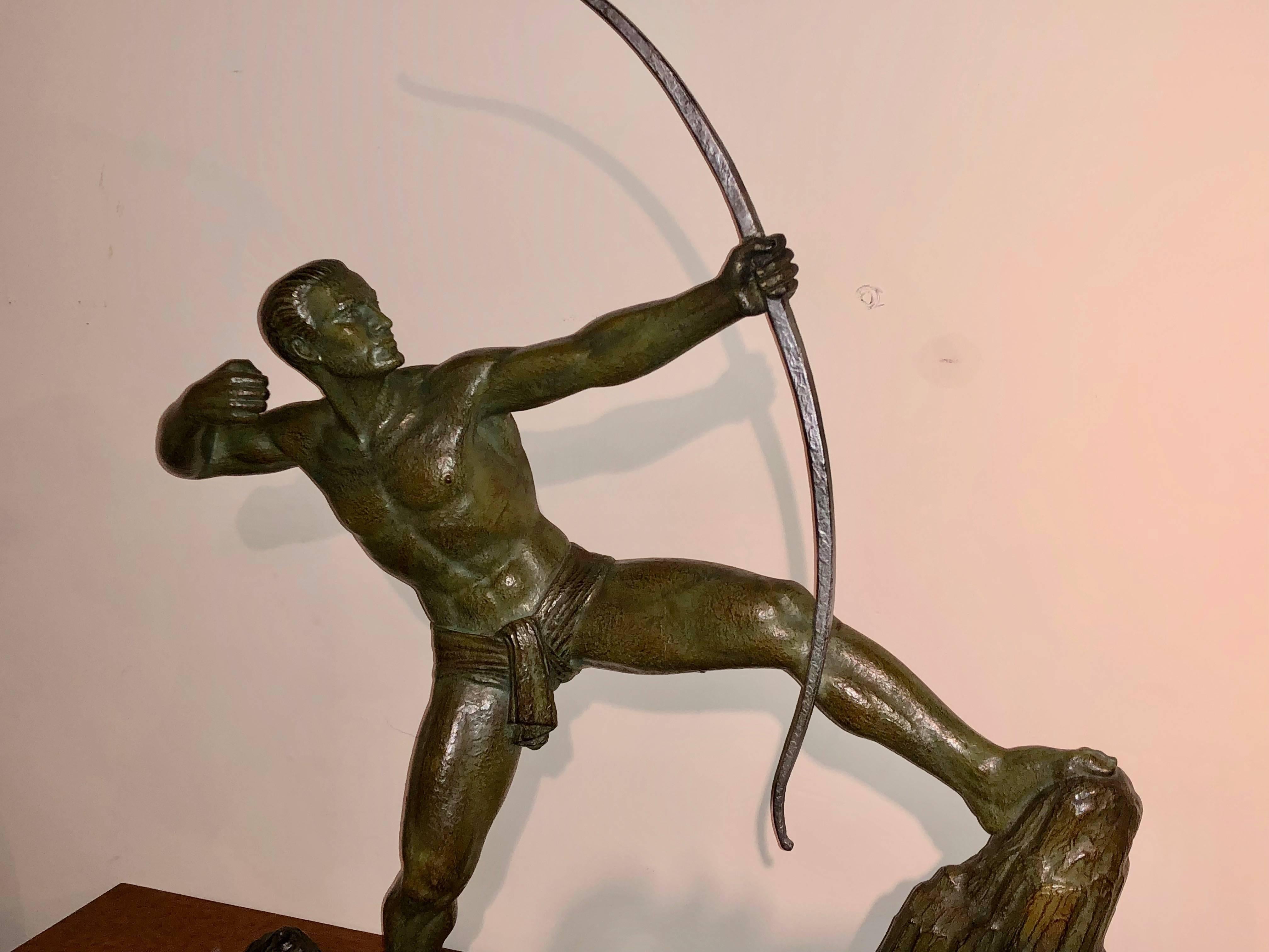 Master sculptor Lucien Gilbert with his famous “The Archer” sculpture embraces the finest in French bronze detailing of the period. The size, quality and weight of this piece is impressive. The verdigris patina has a unique character and the